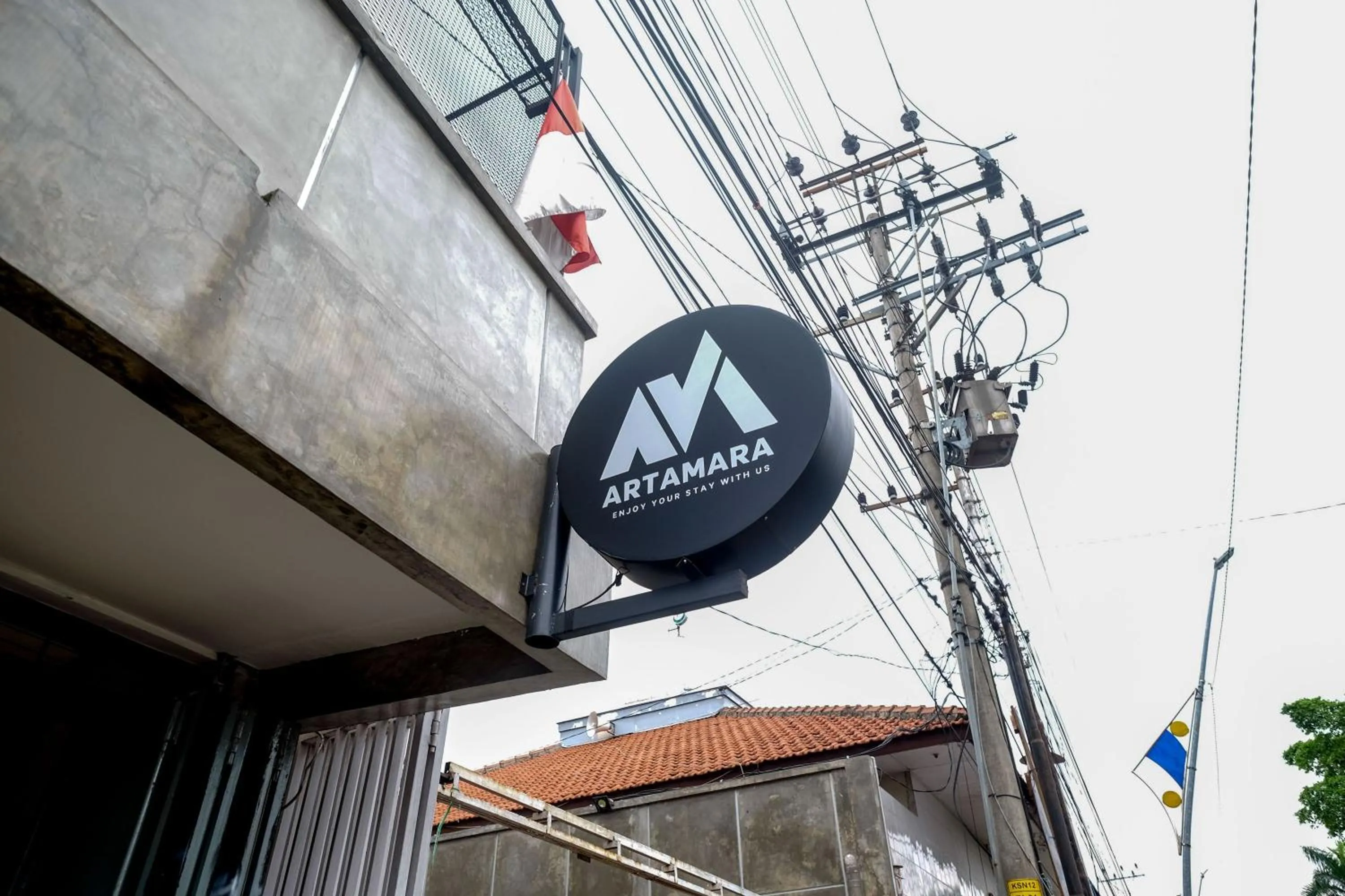 Property logo or sign in Urbanview Hotel Syariah Artamara Tegal by RedDoorz