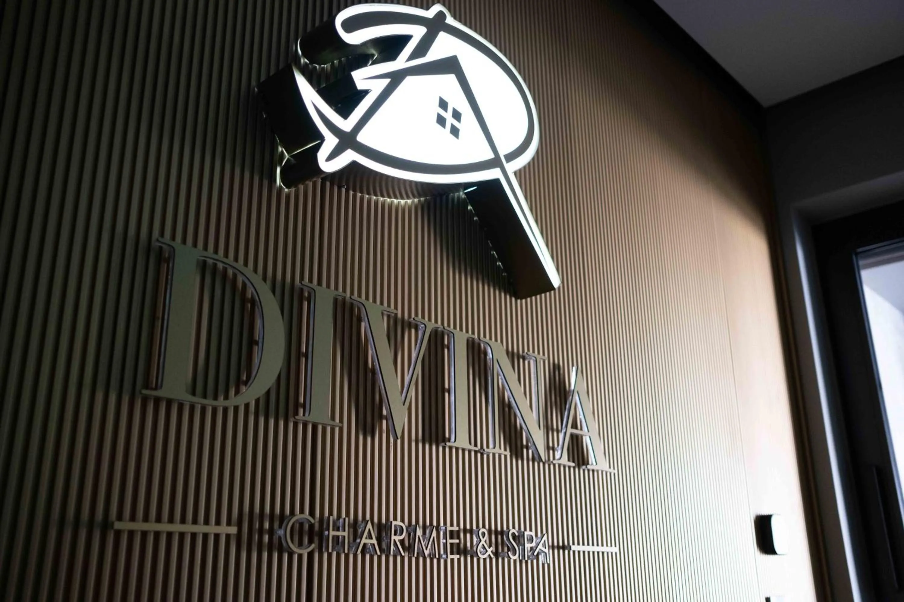 Property logo or sign in Divina Charme