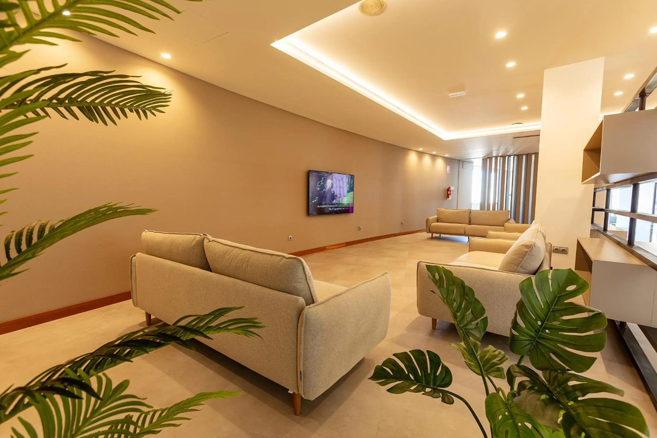 Communal lounge/ TV room in Vértice Indalo Almería