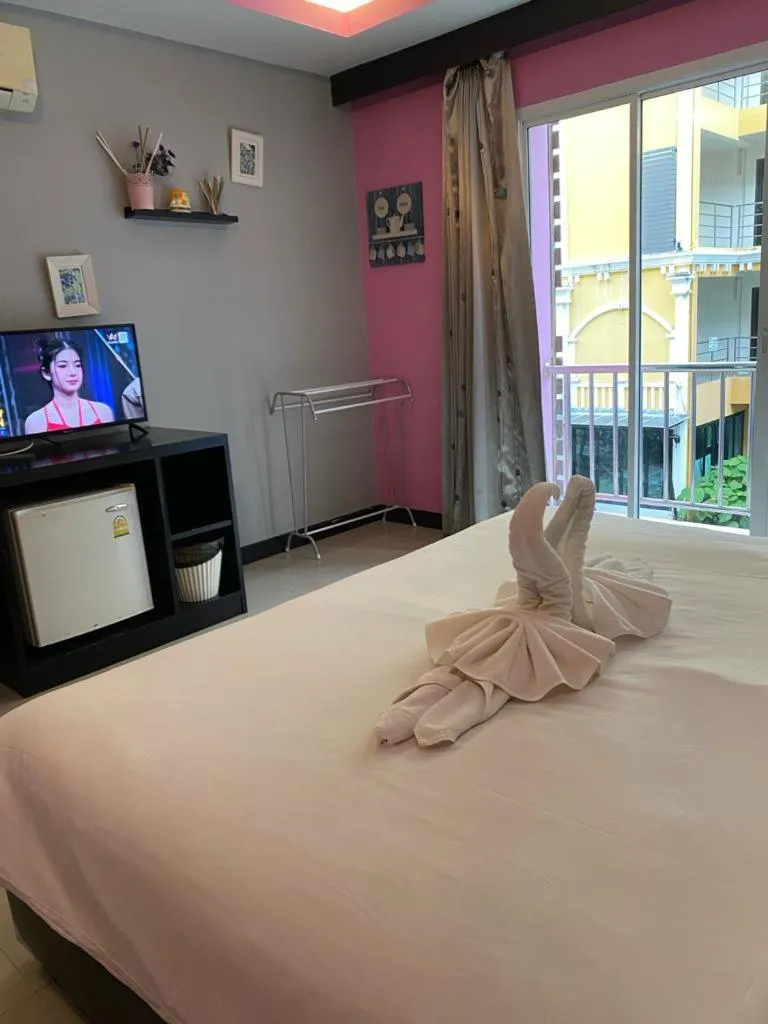 Bed in Lavender Patong Hotel