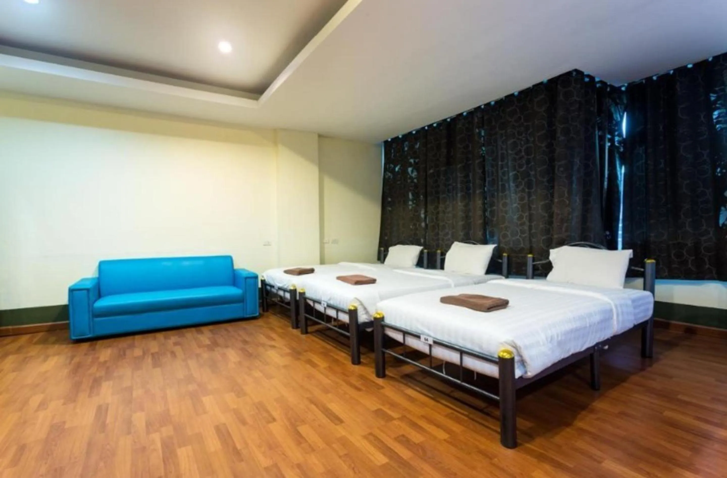 Bed in Lavender Patong Hotel