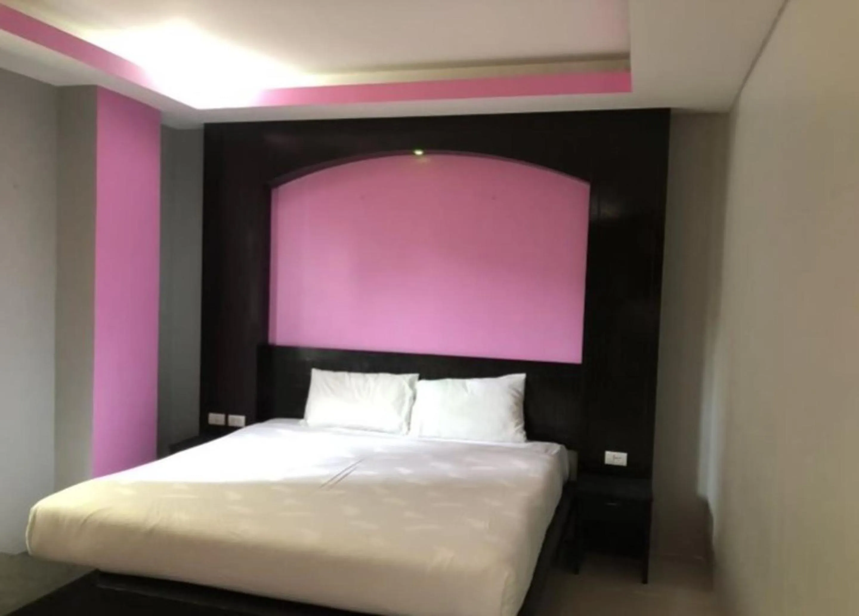 Bed in Lavender Patong Hotel