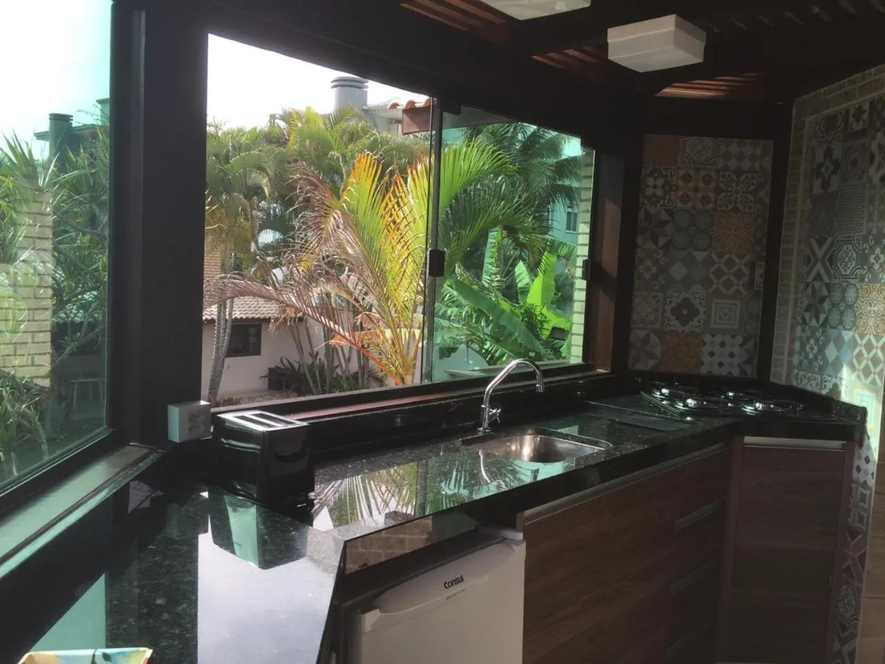 Kitchen or kitchenette in Pousada Solar dos Girassóis