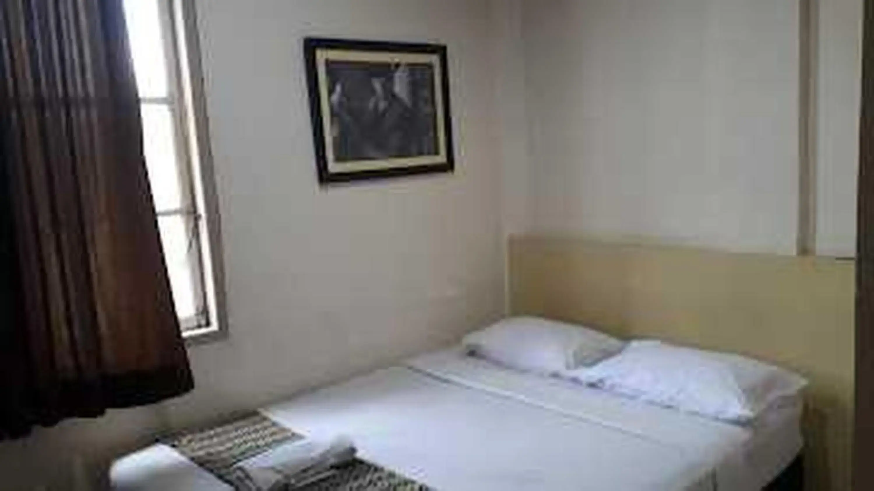 Photo of the whole room, Bed in EXPRESS O 91674 Penginapan Bm Prima Photo of the whole room, Bed in EXPRESS O 91674 Penginapan Bm Prima