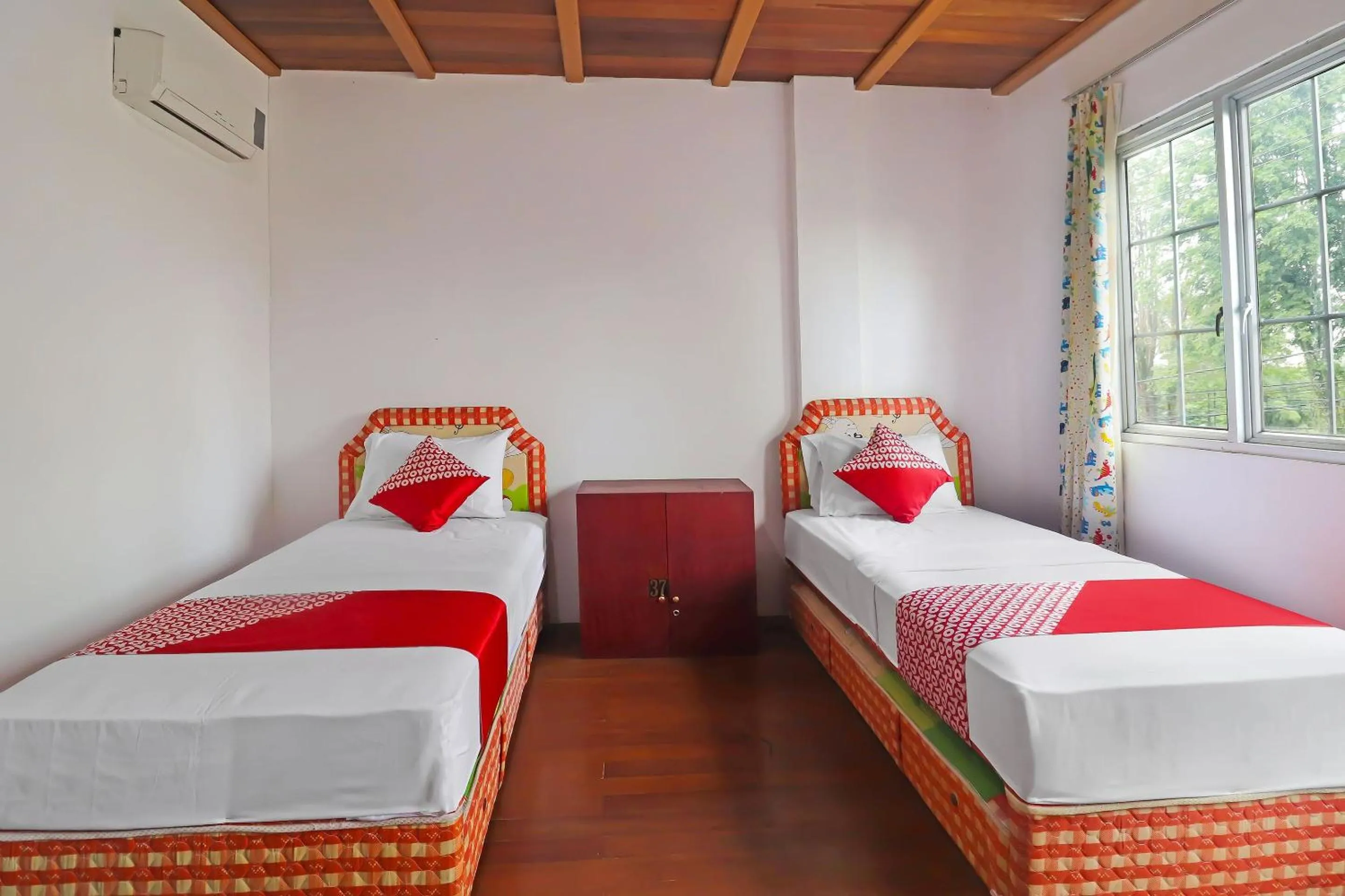 Bedroom in OYO 91807 Kemalasari Guesthouse