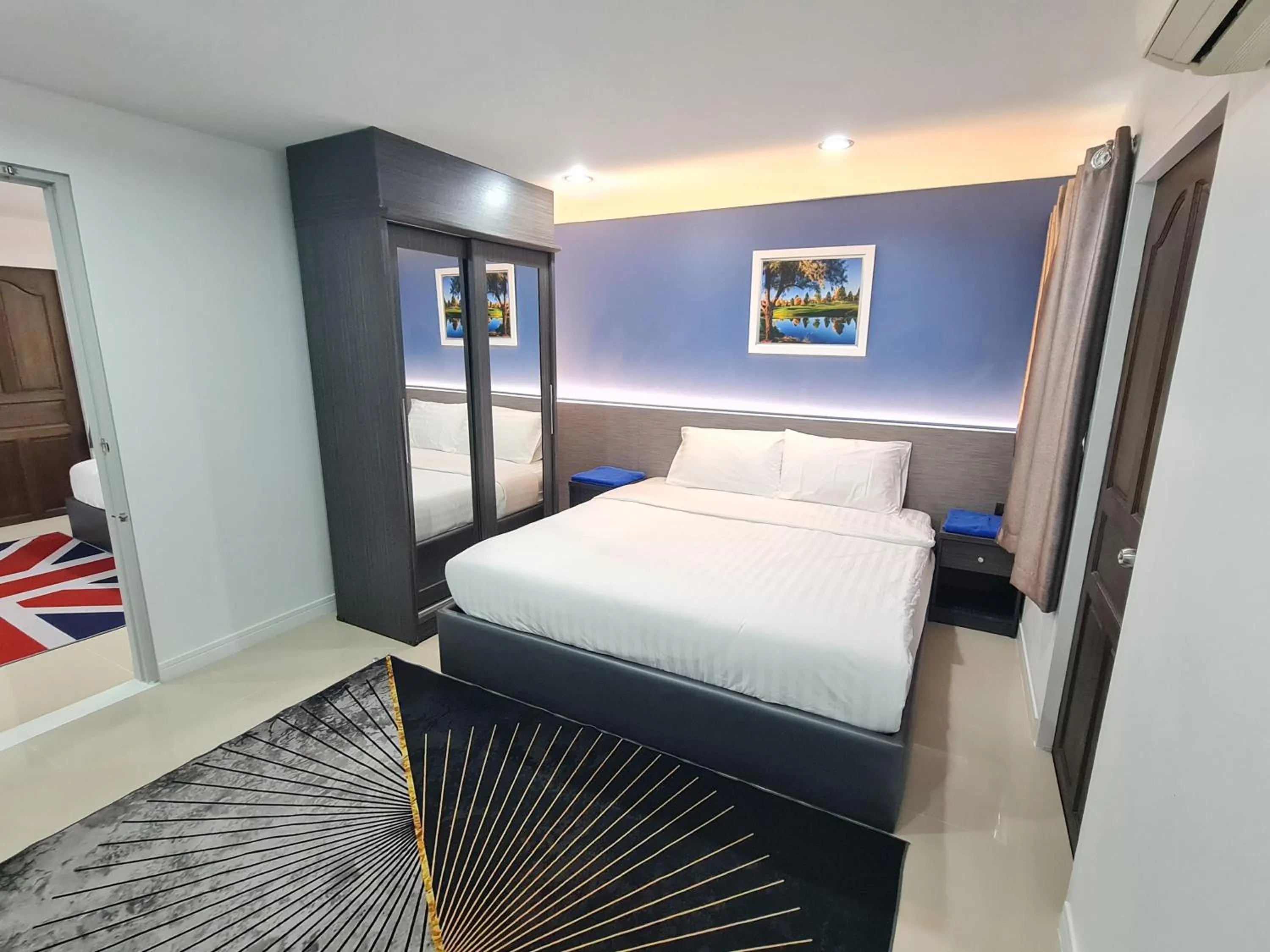 Bed in Poonsuk Place Hotel