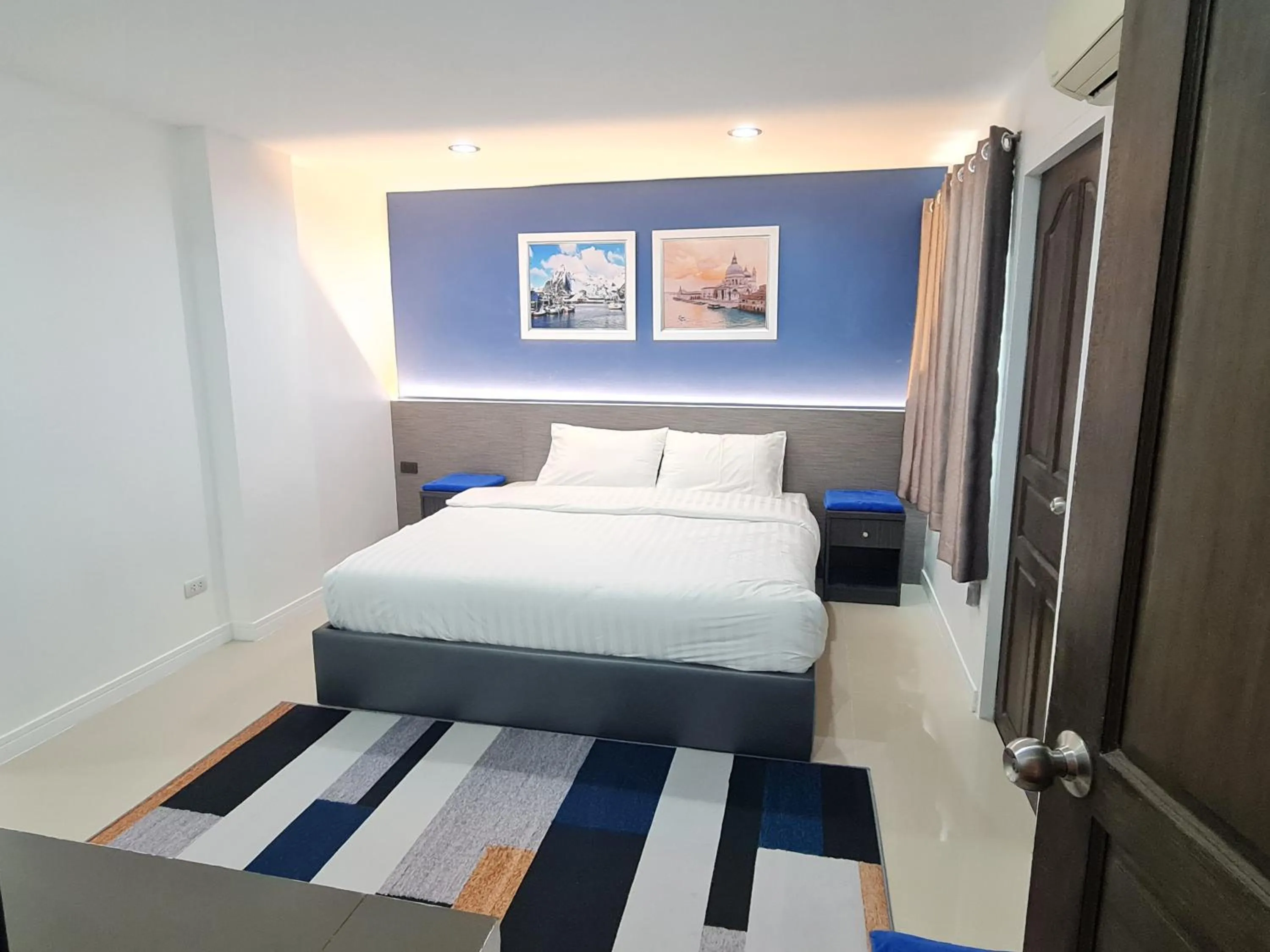 Bed in Poonsuk Place Hotel