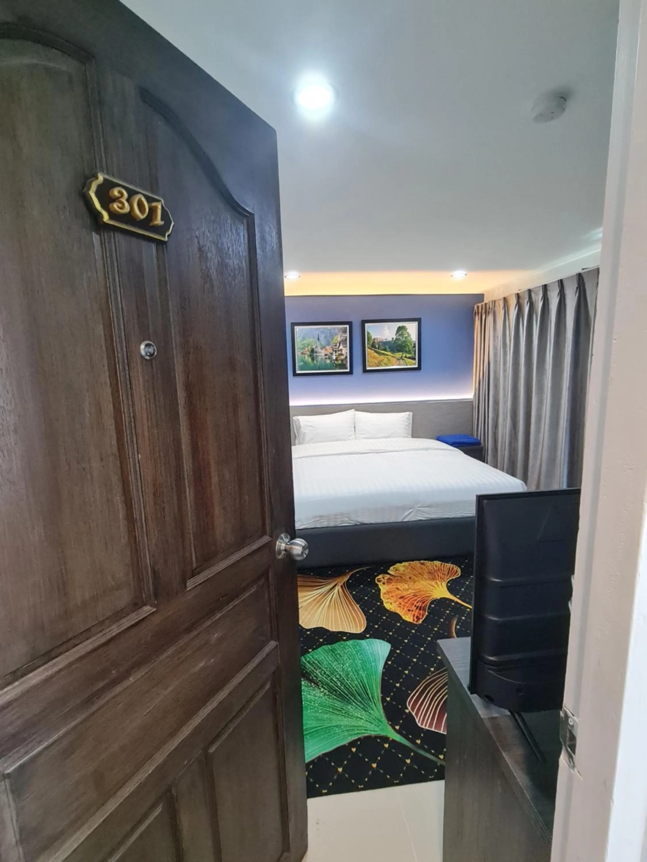 Bed in Poonsuk Place Hotel