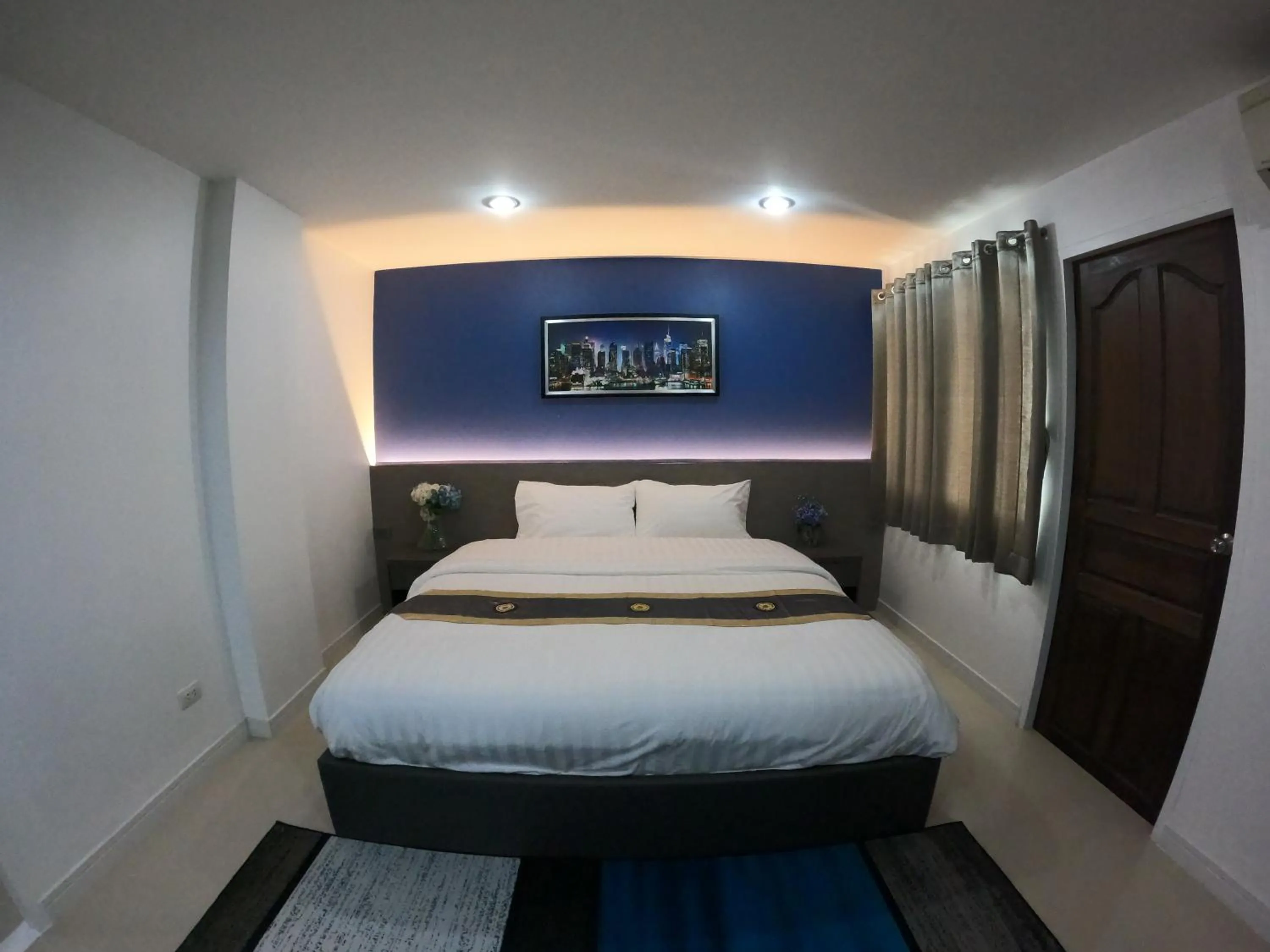 Bed in Poonsuk Place Hotel