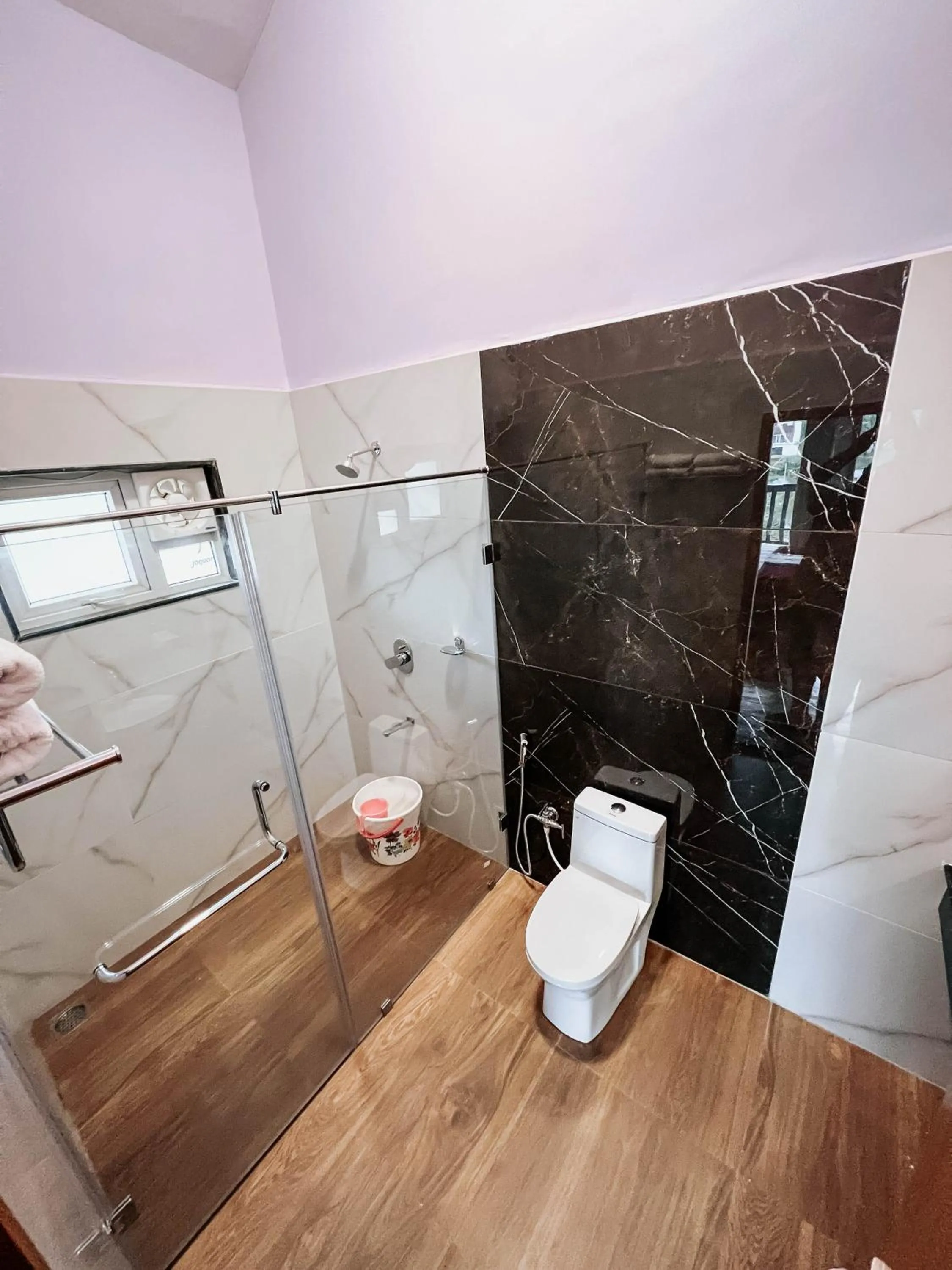 Bathroom in PURPLE ORCHID BY XACRO XPERIENCES