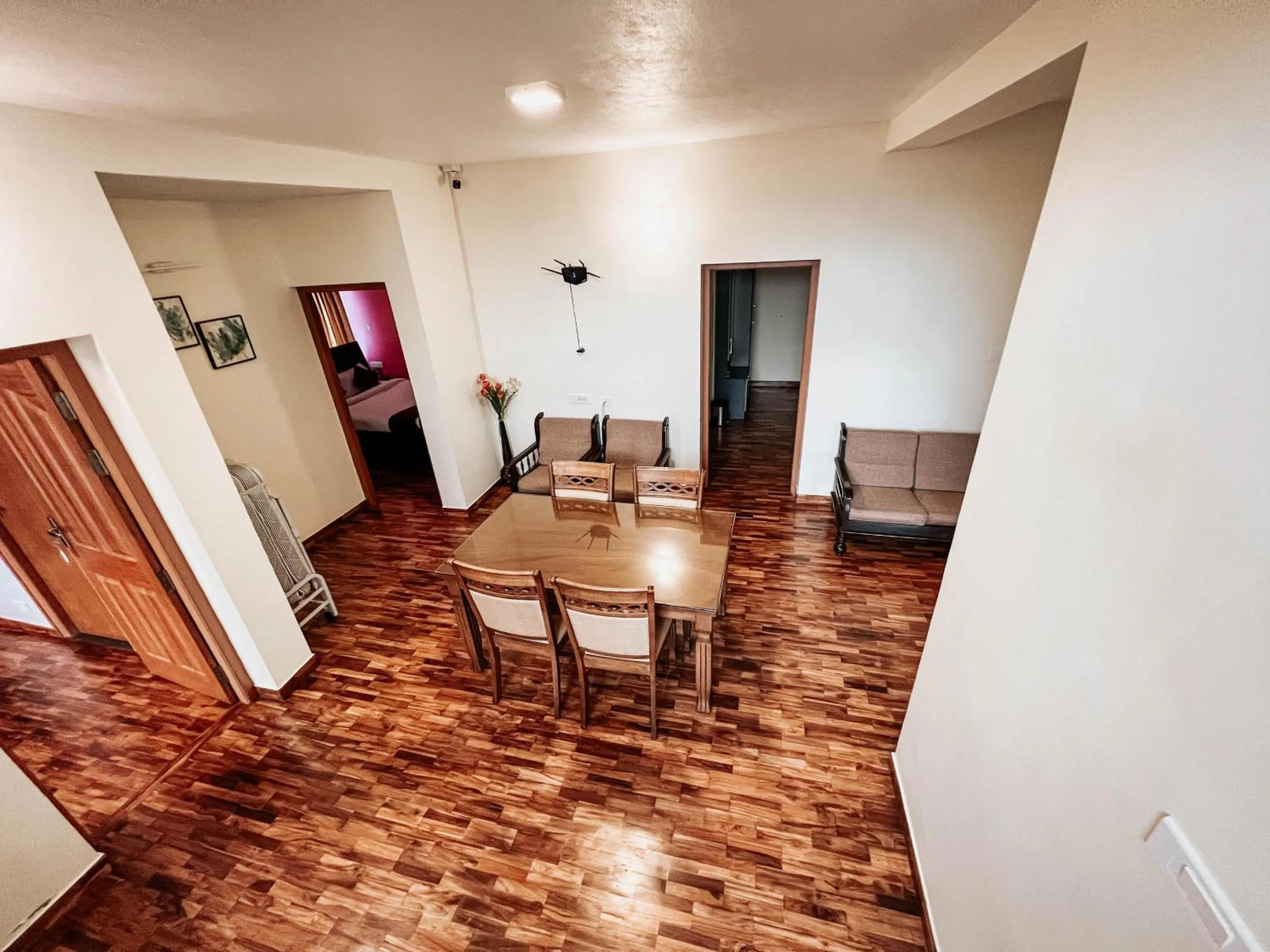 Seating area in PURPLE ORCHID BY XACRO XPERIENCES