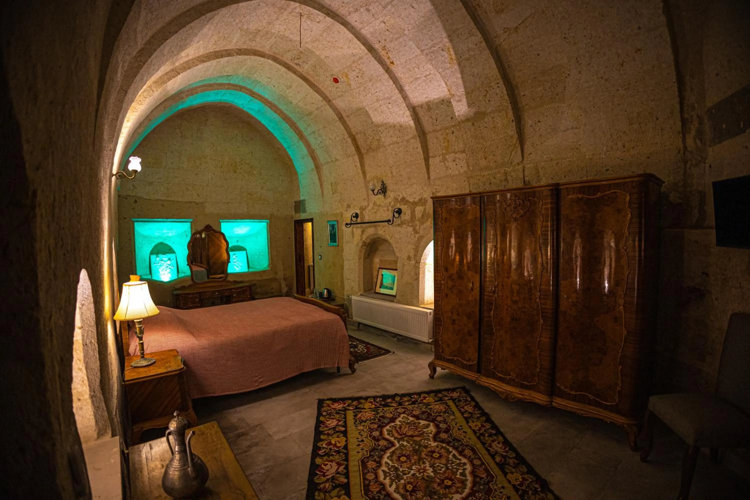 Bed in Pietra Cave Suites