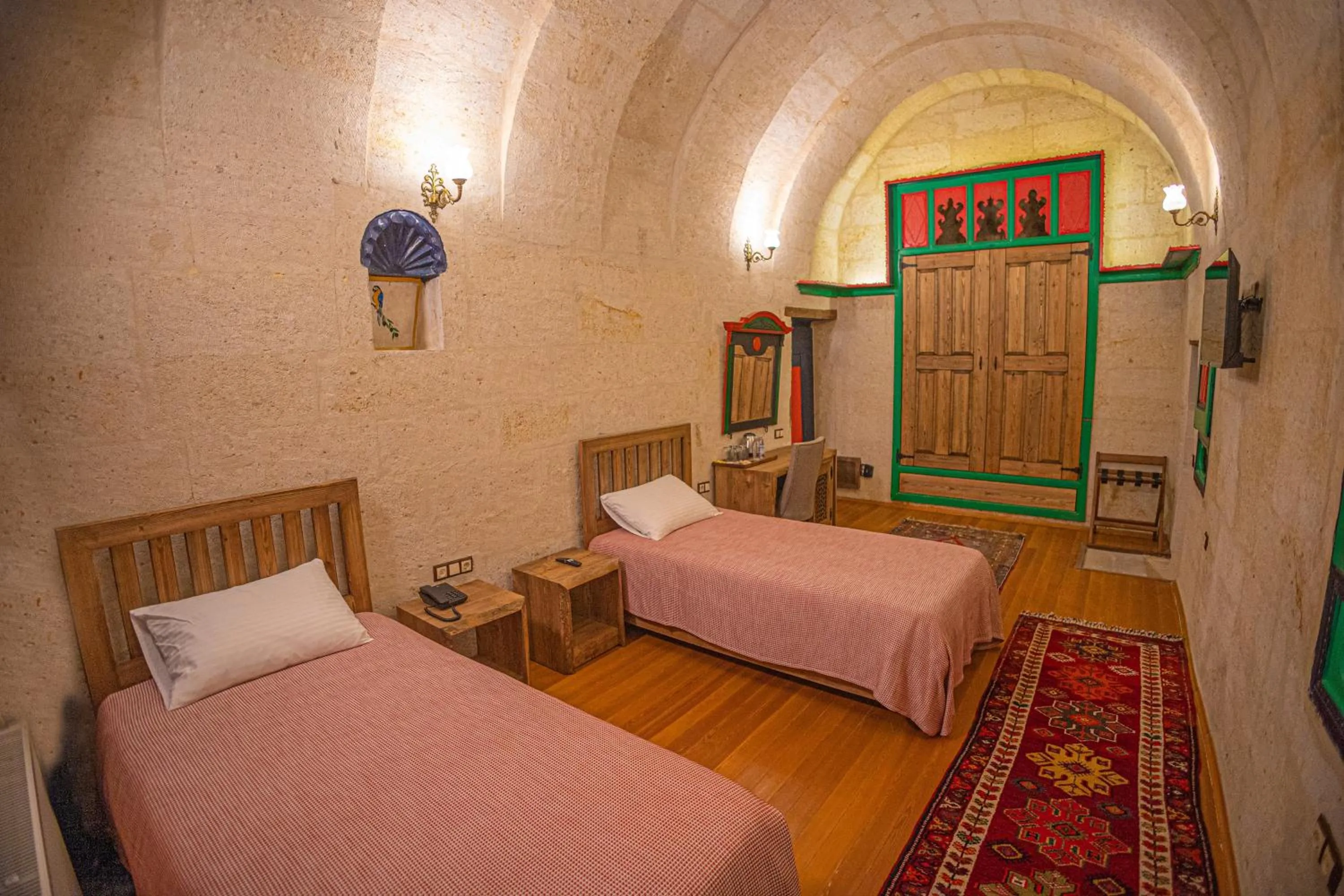 Bed in Pietra Cave Suites