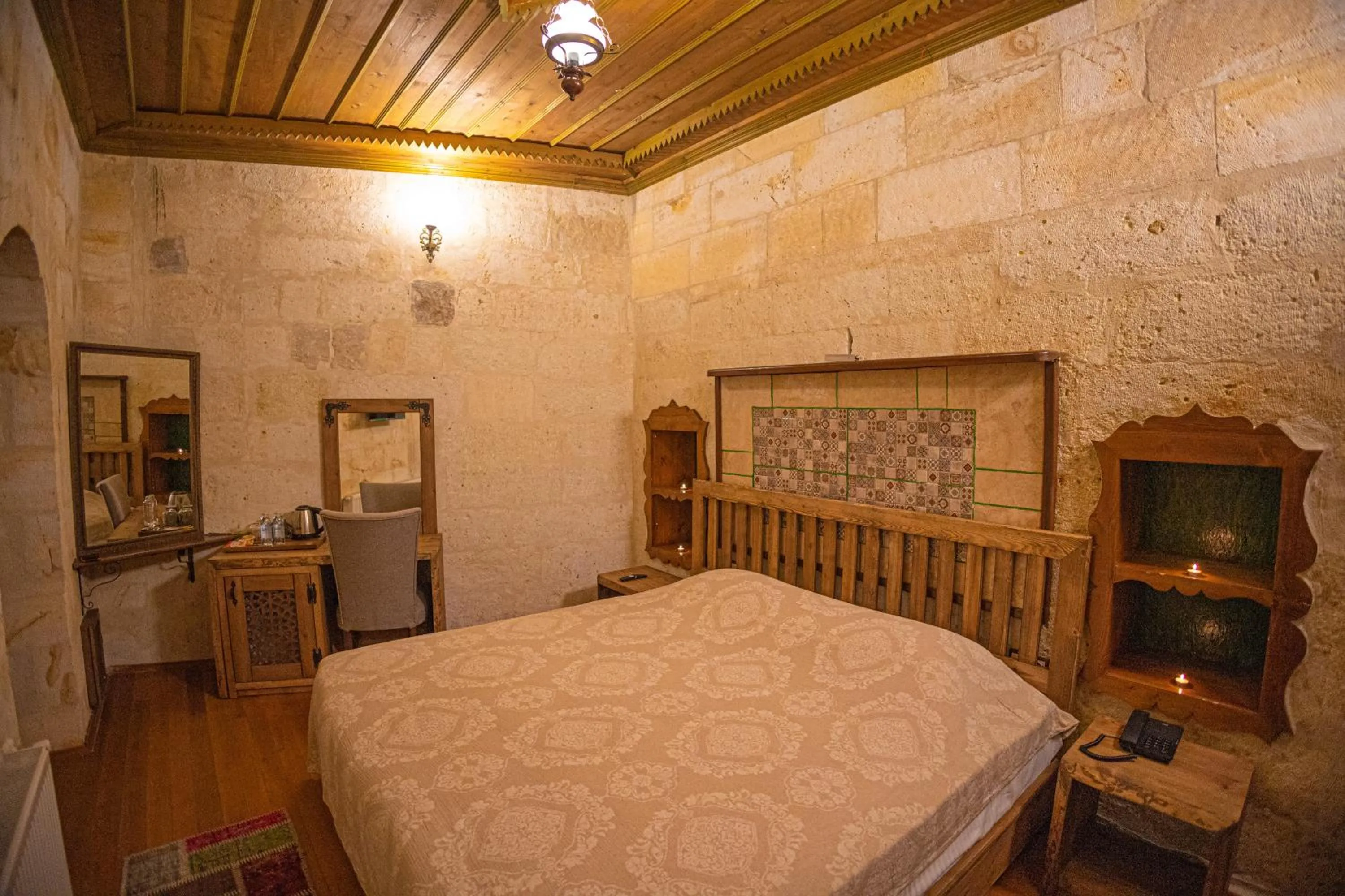 Bedroom in Pietra Cave Suites