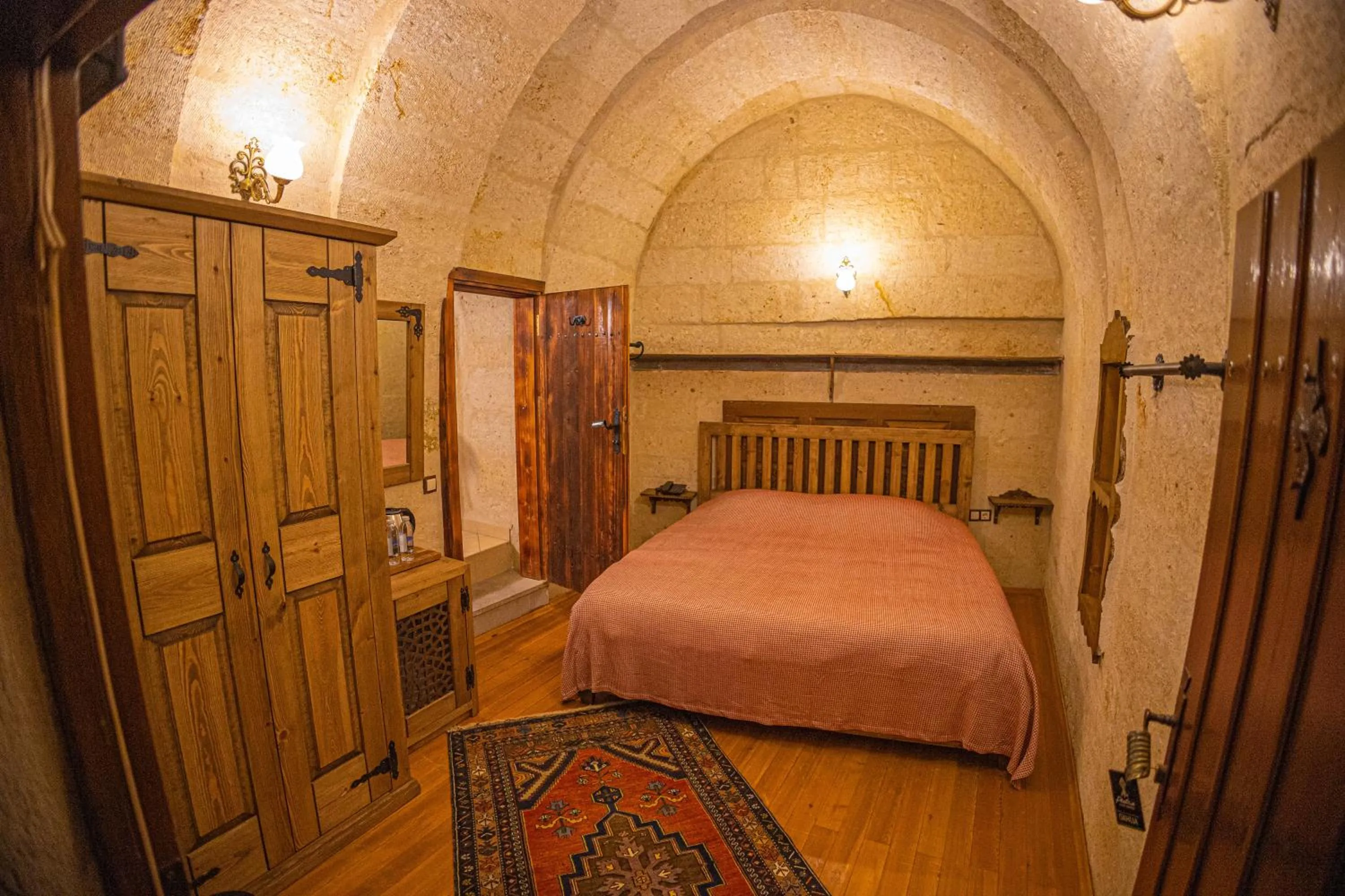 Bedroom in Pietra Cave Suites