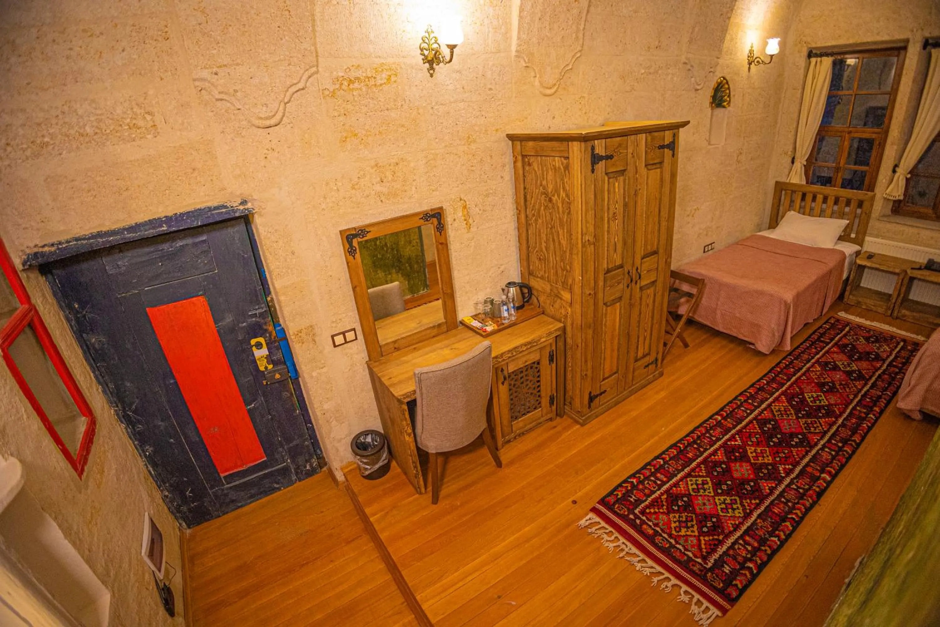 Bed in Pietra Cave Suites