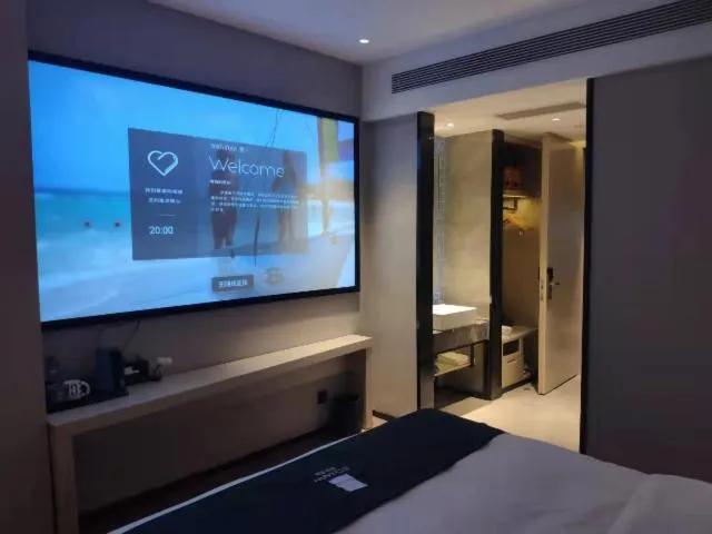 Bed in Echarm Hotel Foshan Guangfo Road Jiaokou Metro Station