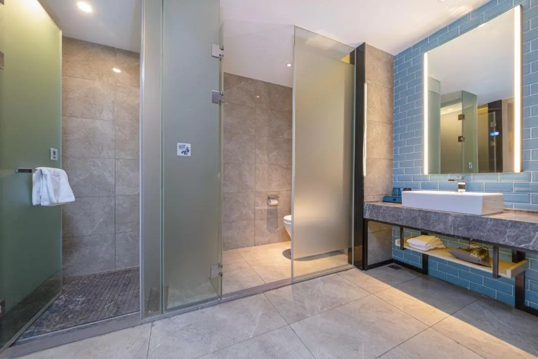 Bed in Echarm Hotel Foshan Guangfo Road Jiaokou Metro Station