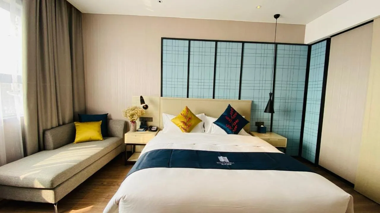 Bed in Echarm Hotel Foshan Guangfo Road Jiaokou Metro Station