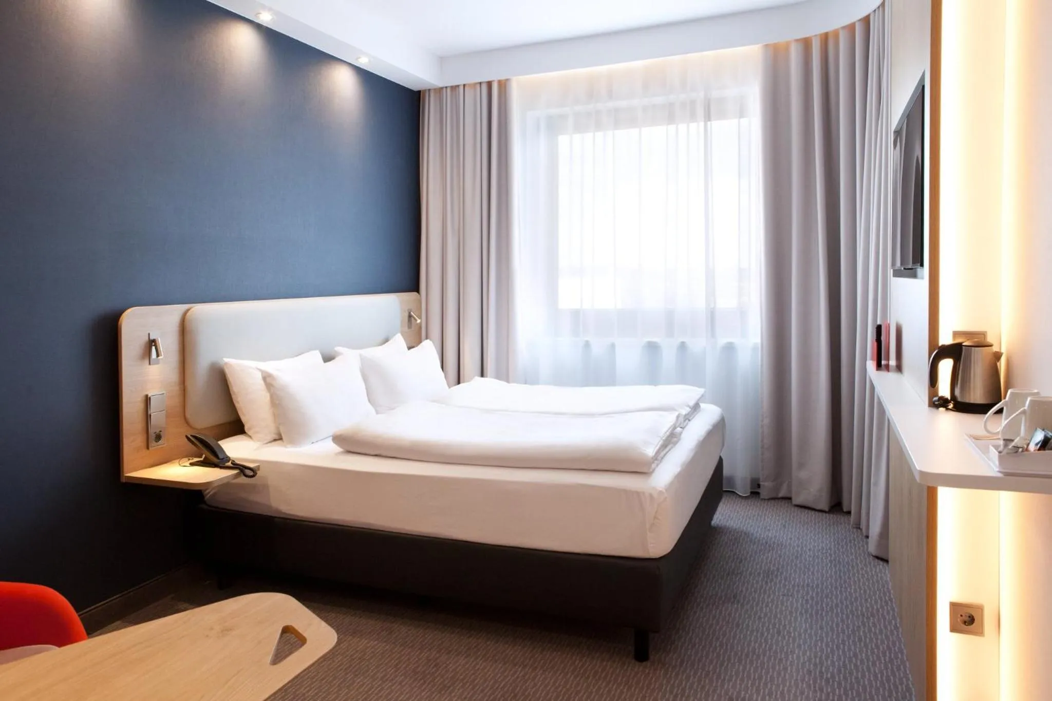 Photo of the whole room, Bed in Holiday Inn Express & Suites - Basel - Allschwil by IHG