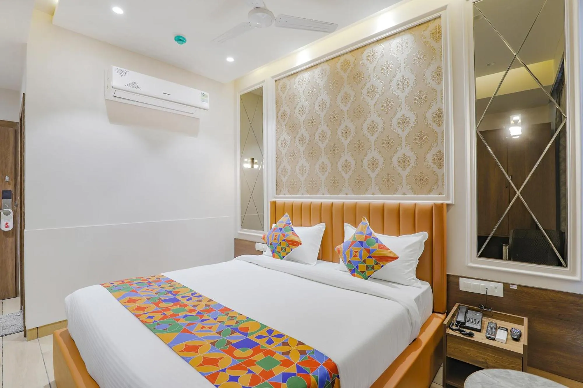 Bed in FabHotel Meritus Inn