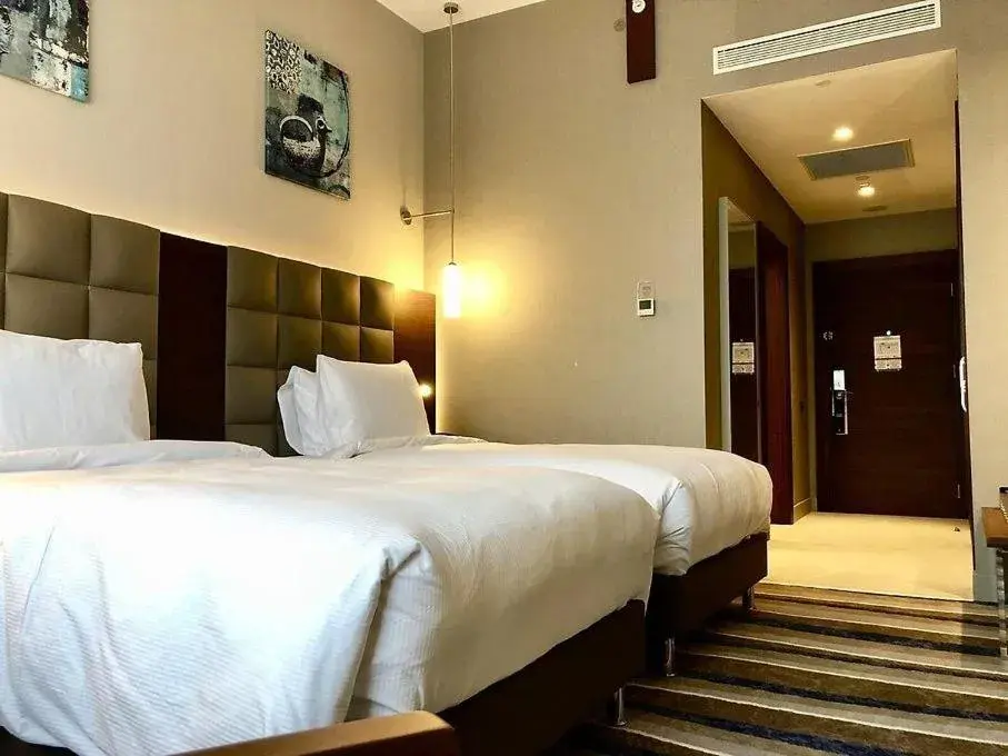 Bed in Questa Thermal & Spa Hotel Bed in Questa Thermal & Spa Hotel