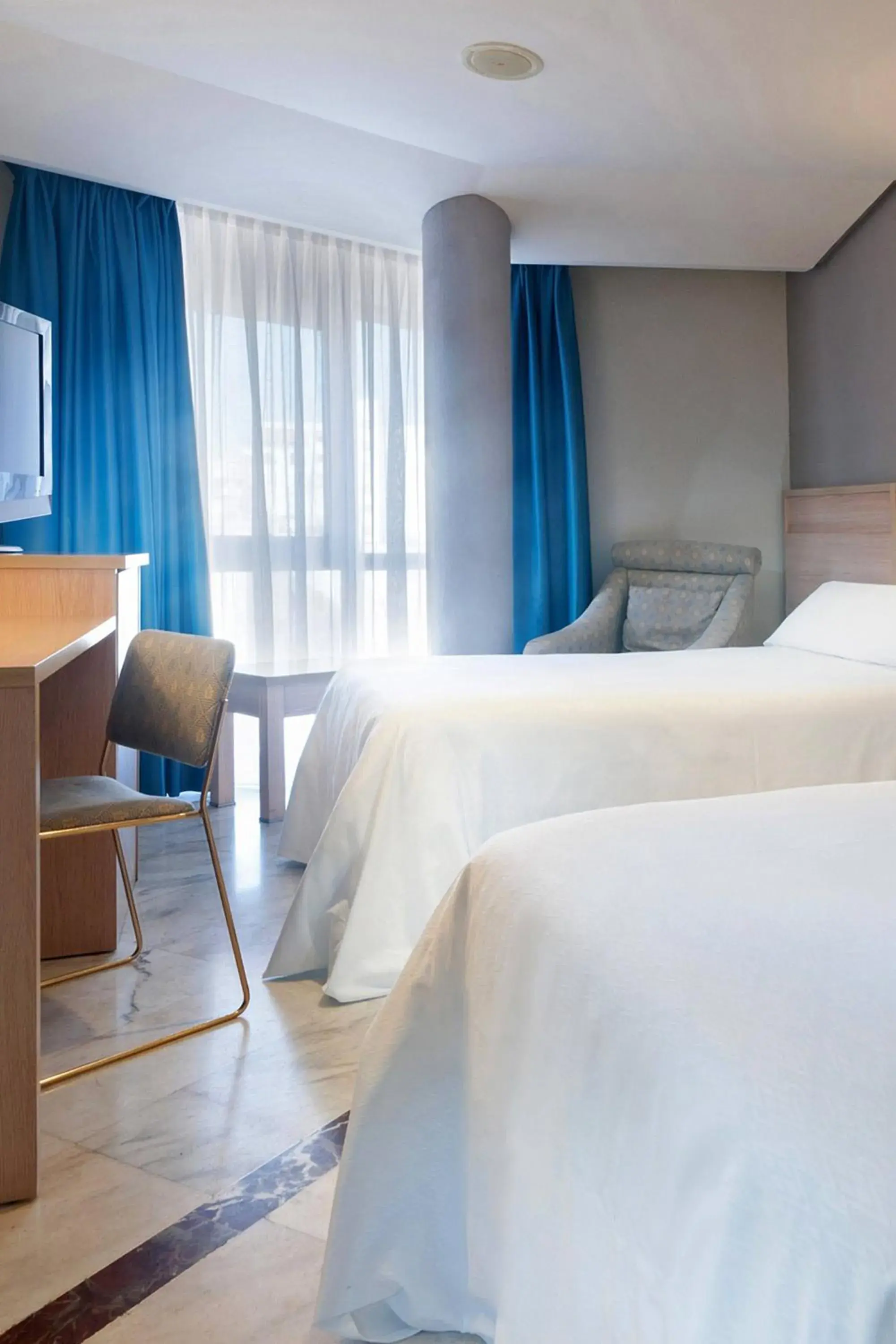 Property building, Bed in Hotel Puertollano Property building, Bed in Hotel Puertollano