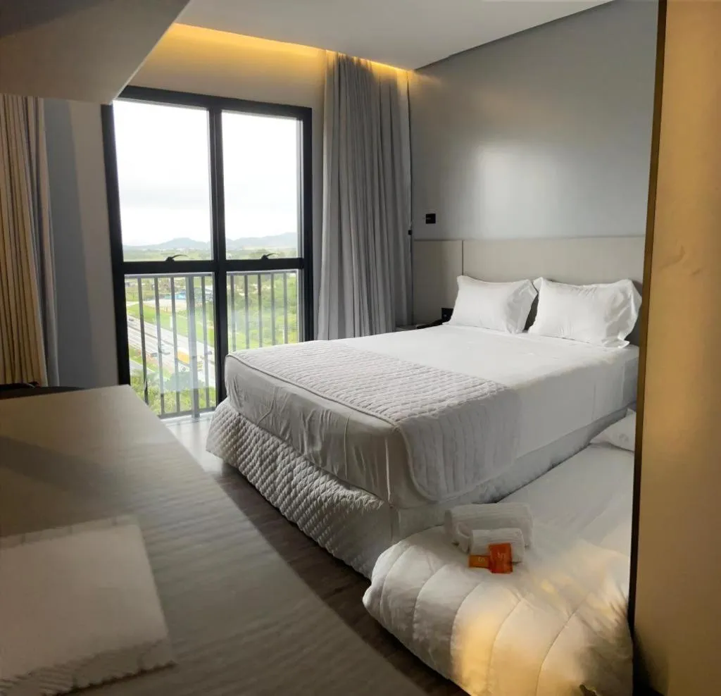 Photo of the whole room, Bed in Tri Hotel Premium Itapema