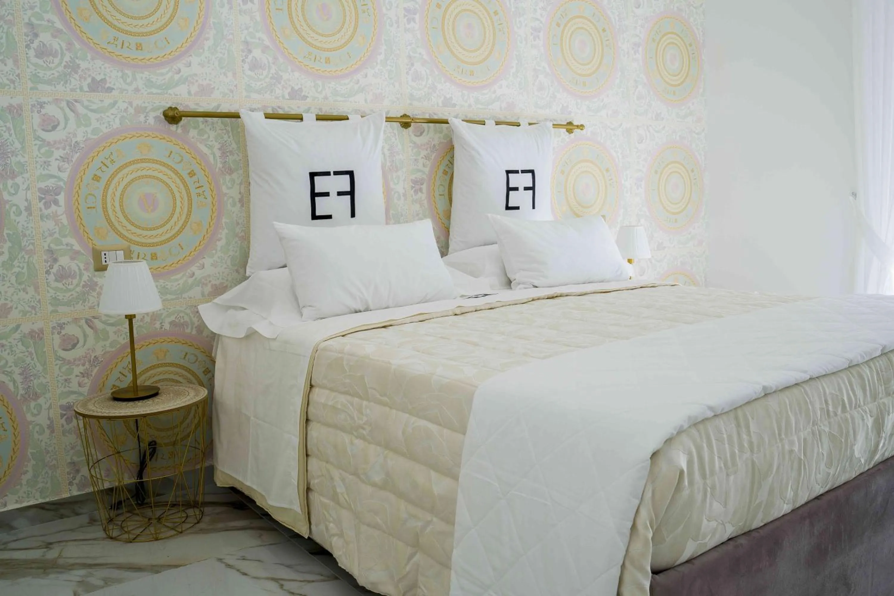 Bed in EF LUXURY LIVING RESORT AND SPA