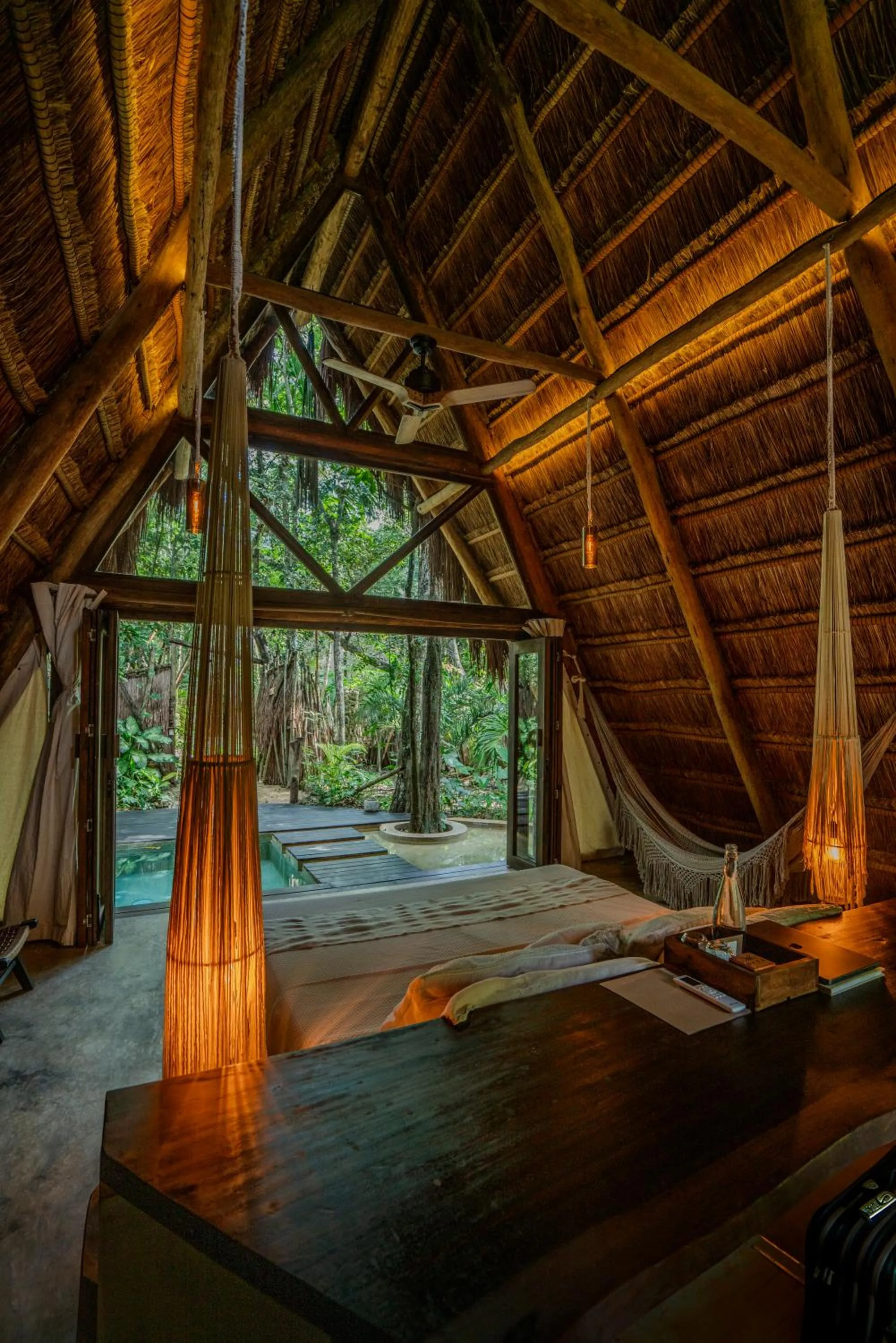 Bed in Naya Bacalar Lagoon Front Hotel