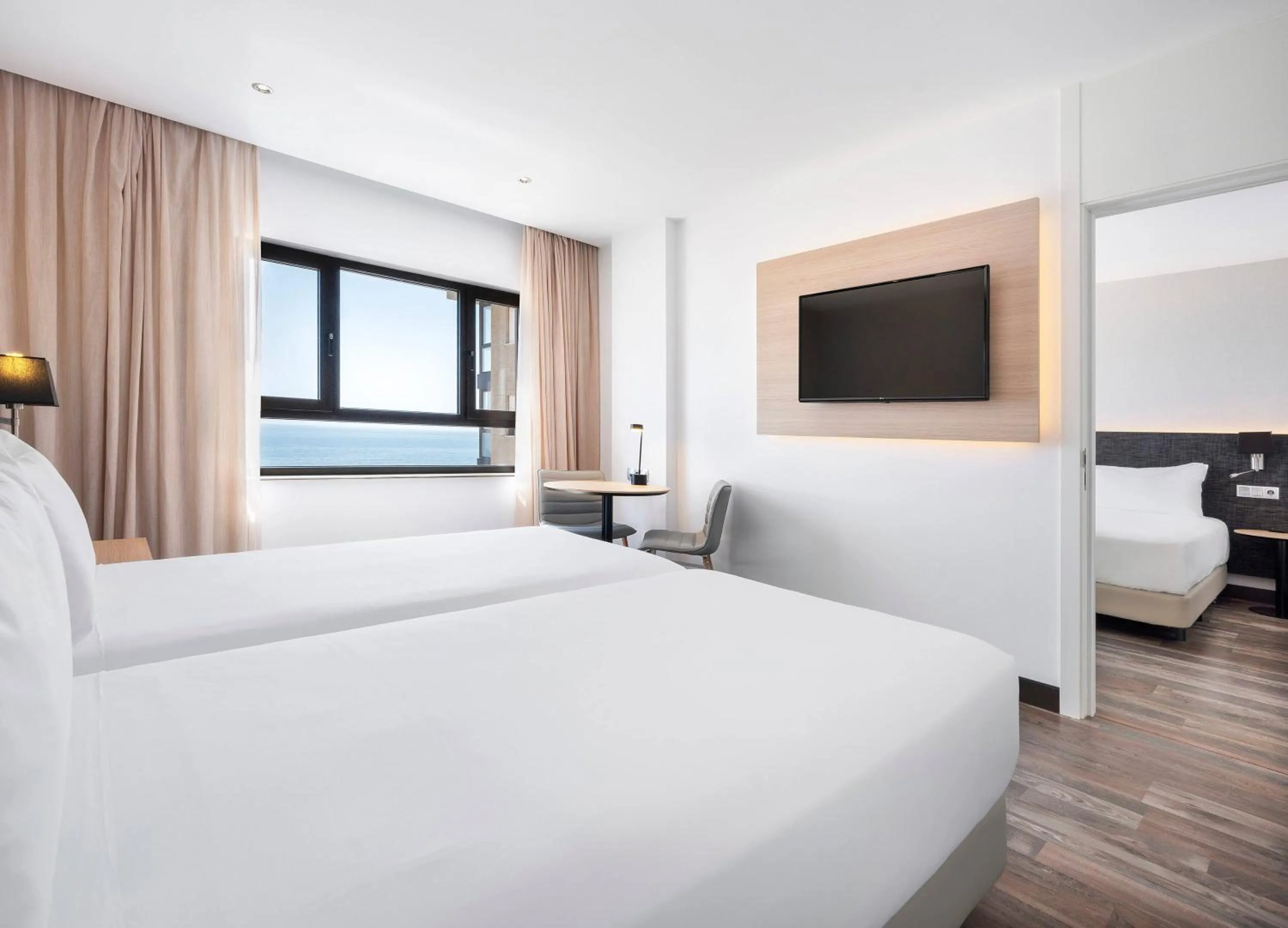 Bed in Hotel Cádiz Paseo del Mar Affiliated by Meliá