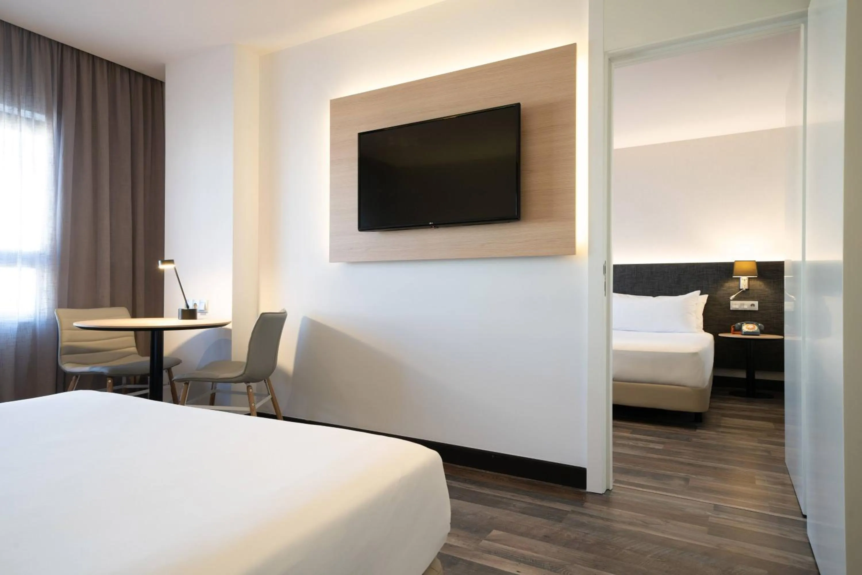 Bed in Hotel Cádiz Paseo del Mar Affiliated by Meliá