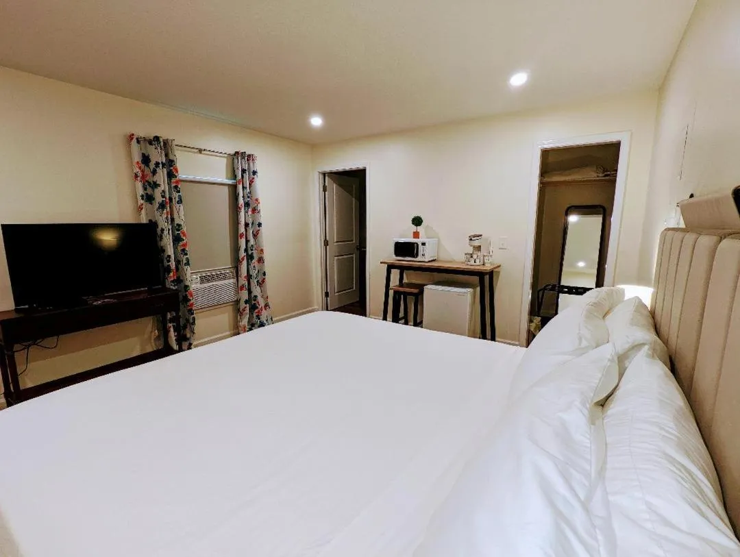 Bed in The Honey Bee Motel