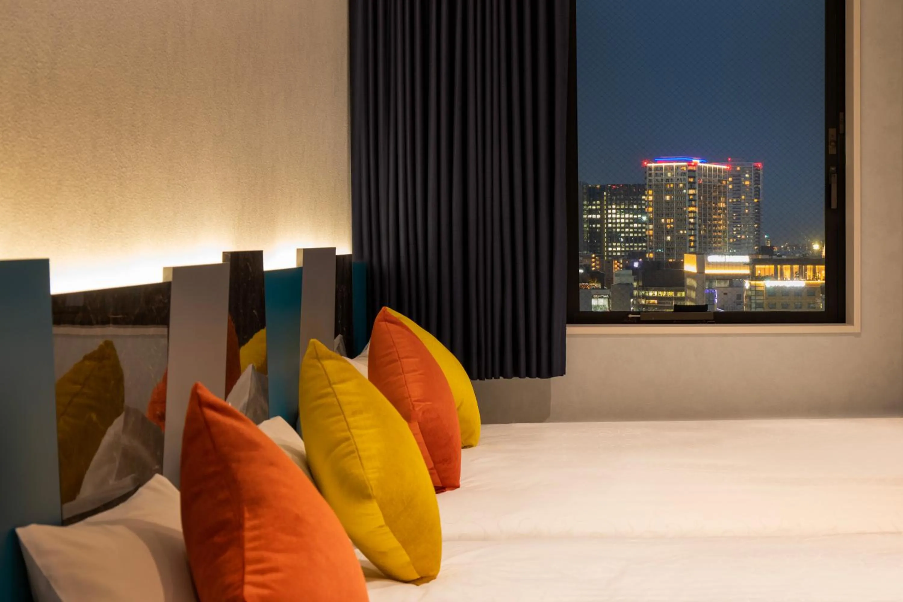 Bed in karaksa hotel colors Tokyo Yaesu