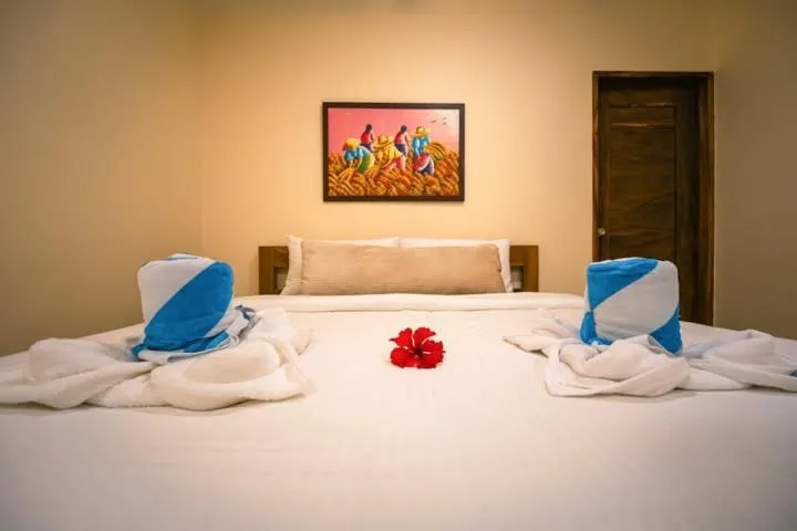 Bed in Antique Amor Bungalows & Villas