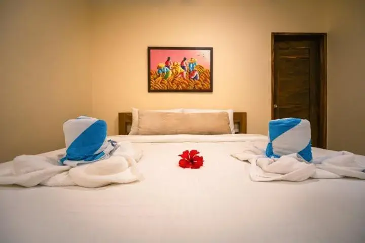 Bed in Antique Amor Bungalows & Villas Bed in Antique Amor Bungalows & Villas