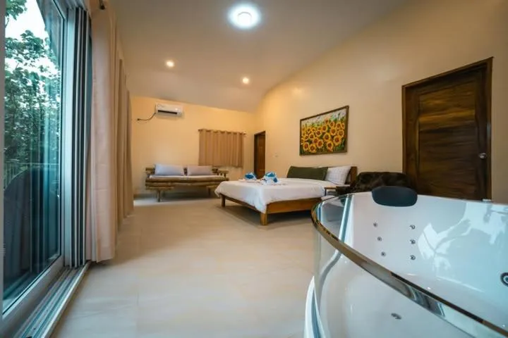 Bed in Antique Amor Bungalows & Villas