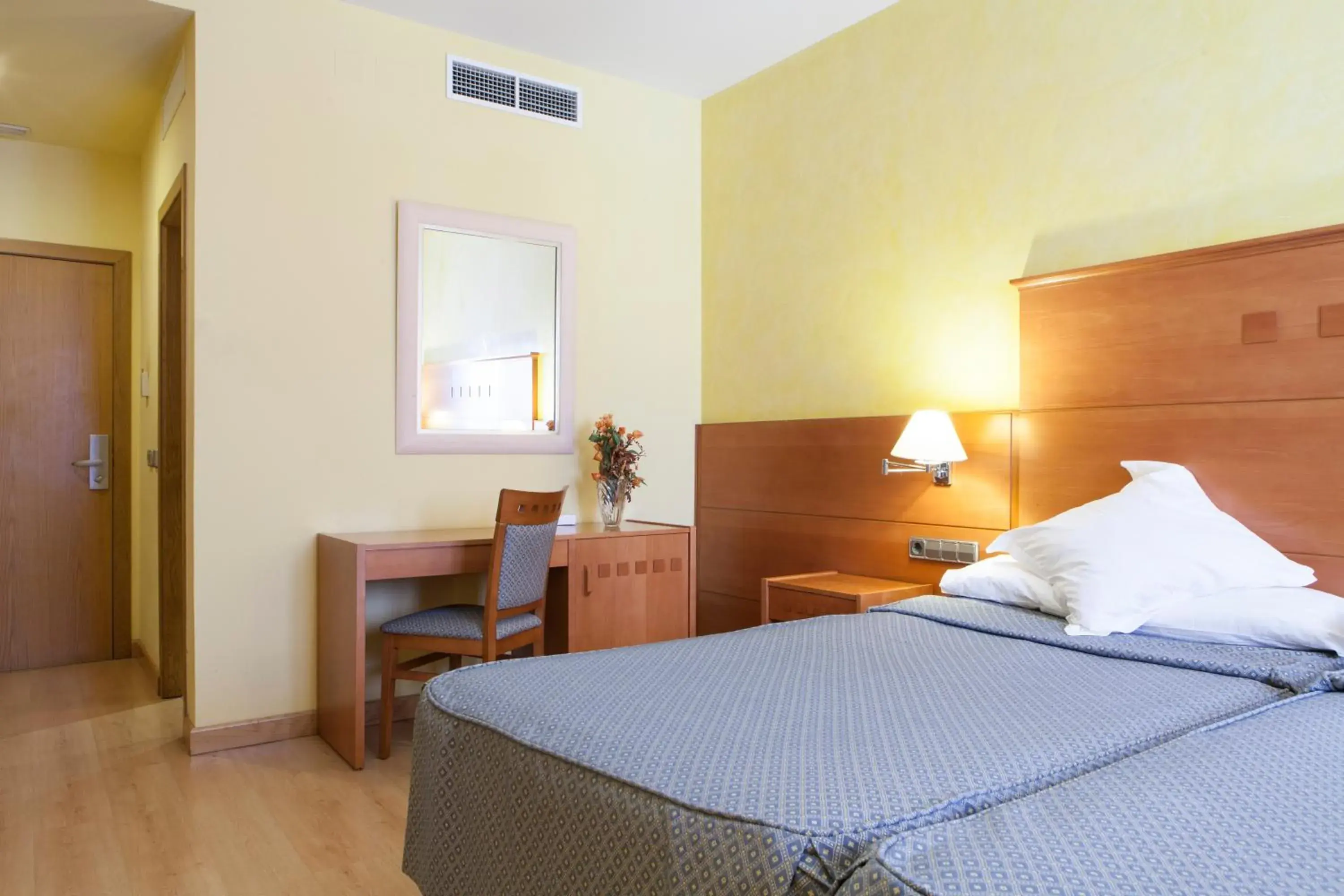 Bed in Hotel Cervantes Bed in Hotel Cervantes