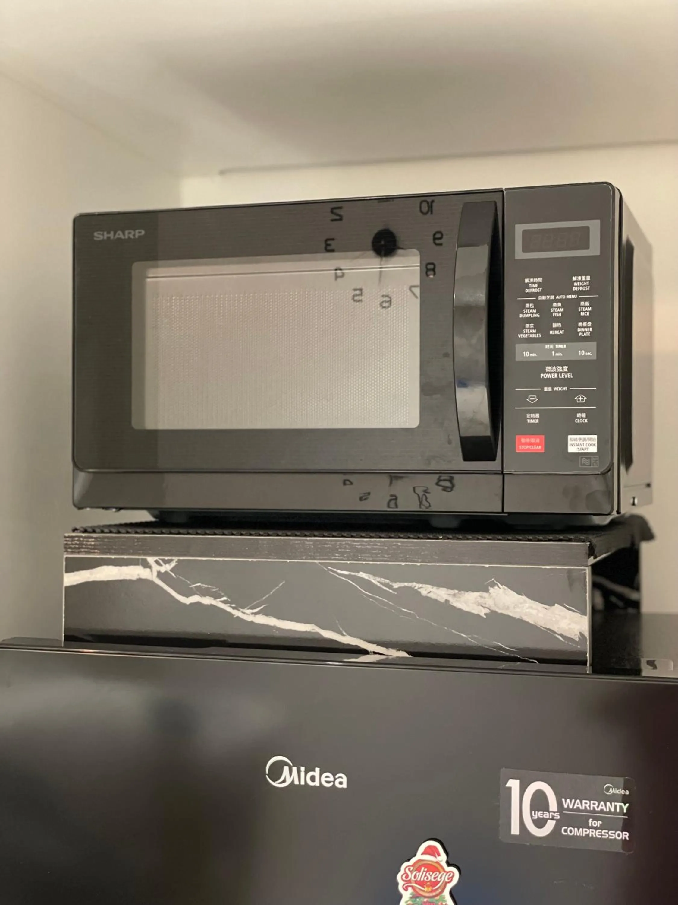 Kitchen or kitchenette in Continew Residence by Shuen