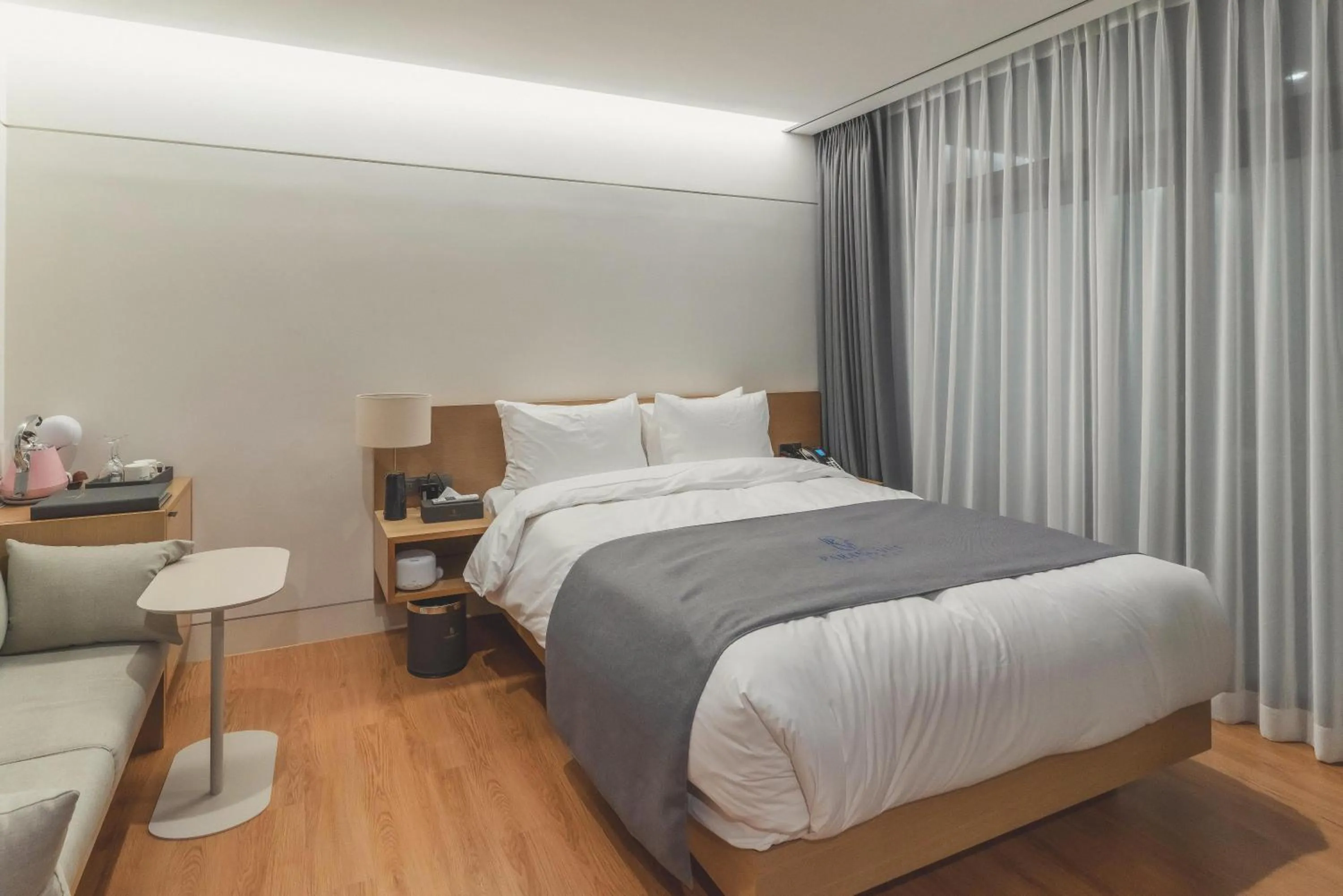 Bed in Hotel Parangvue