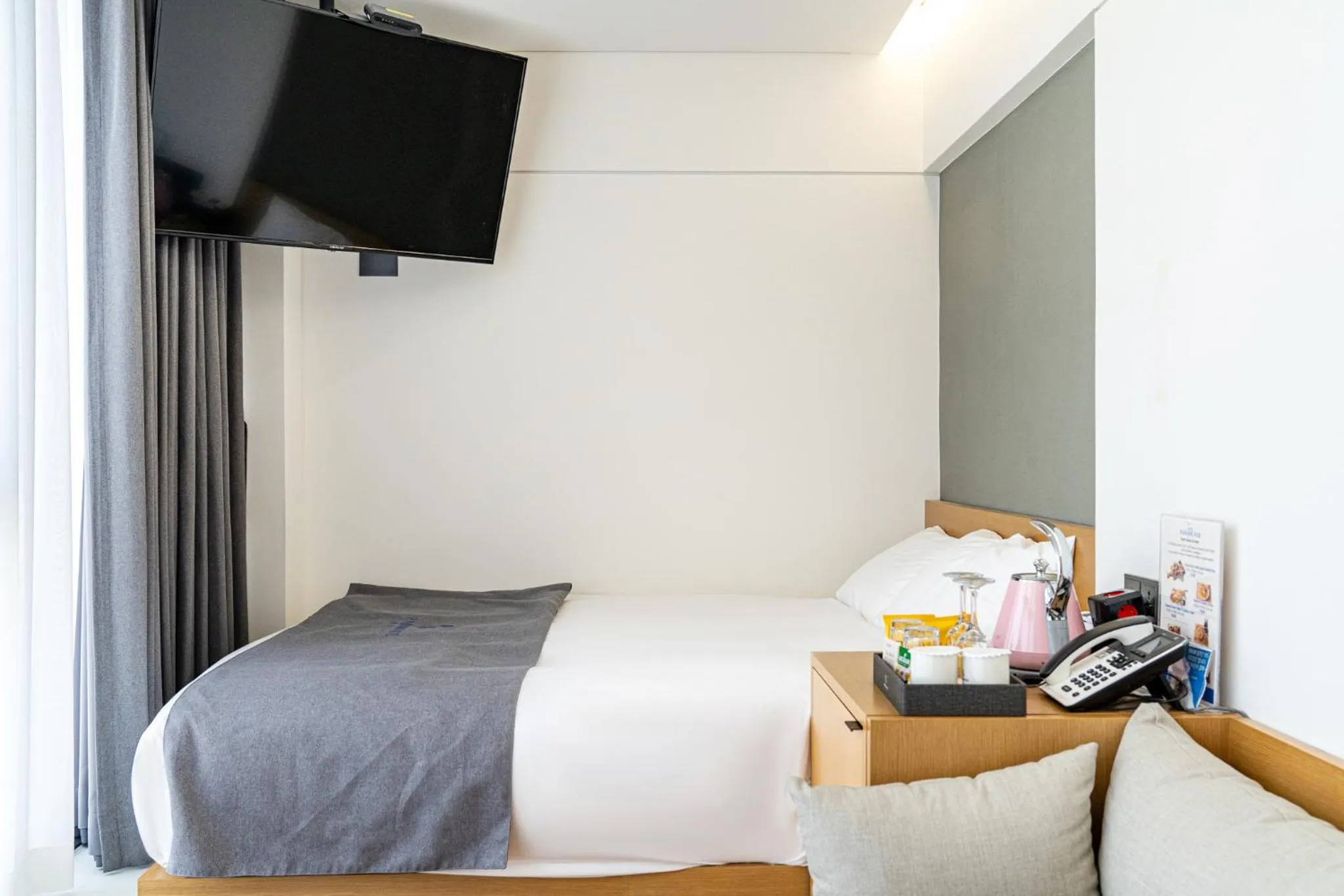 Bed in Hotel Parangvue