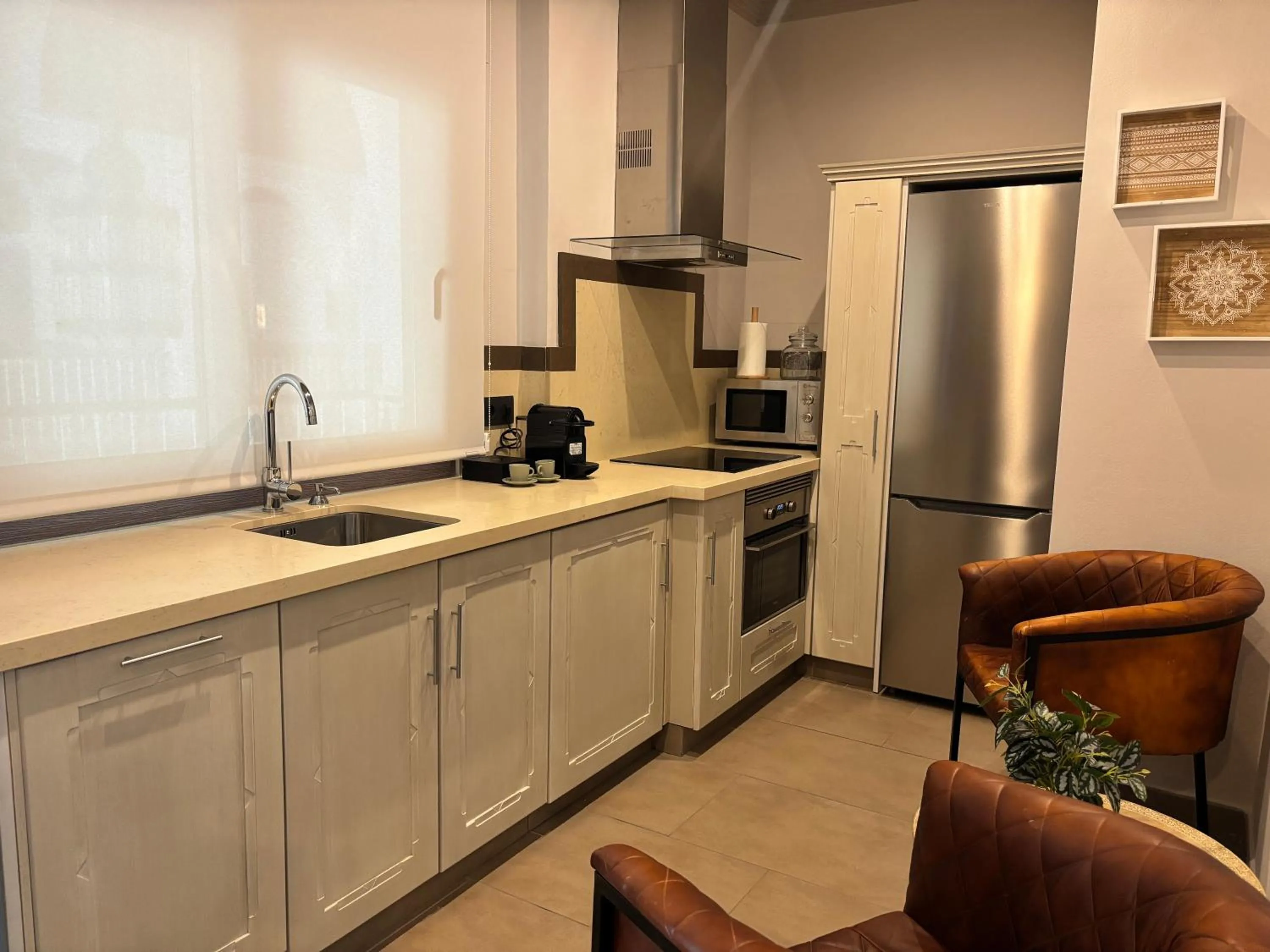 Kitchen or kitchenette in Apartamentos Turísticos La Baílla