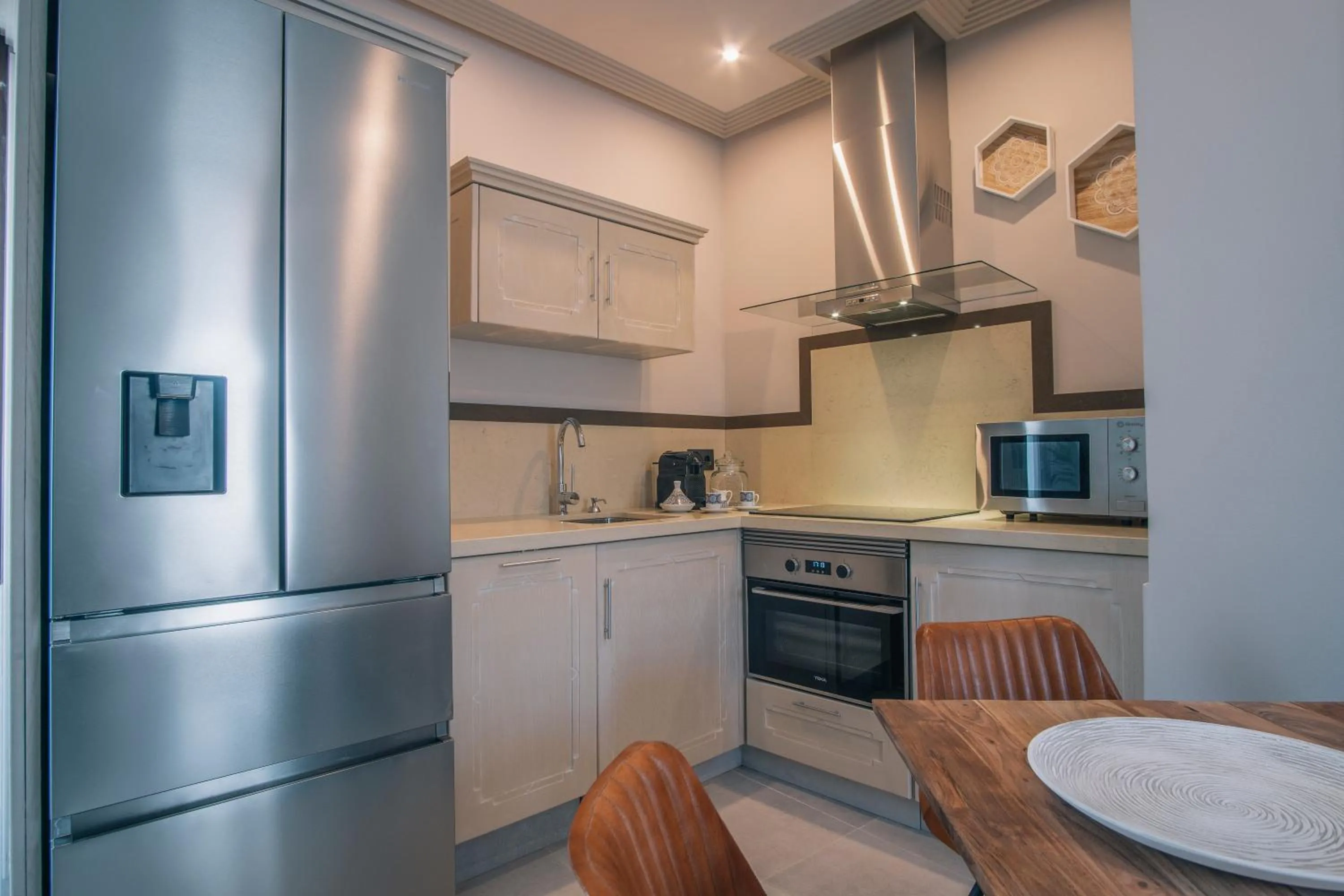 Kitchen or kitchenette in Apartamentos Turísticos La Baílla