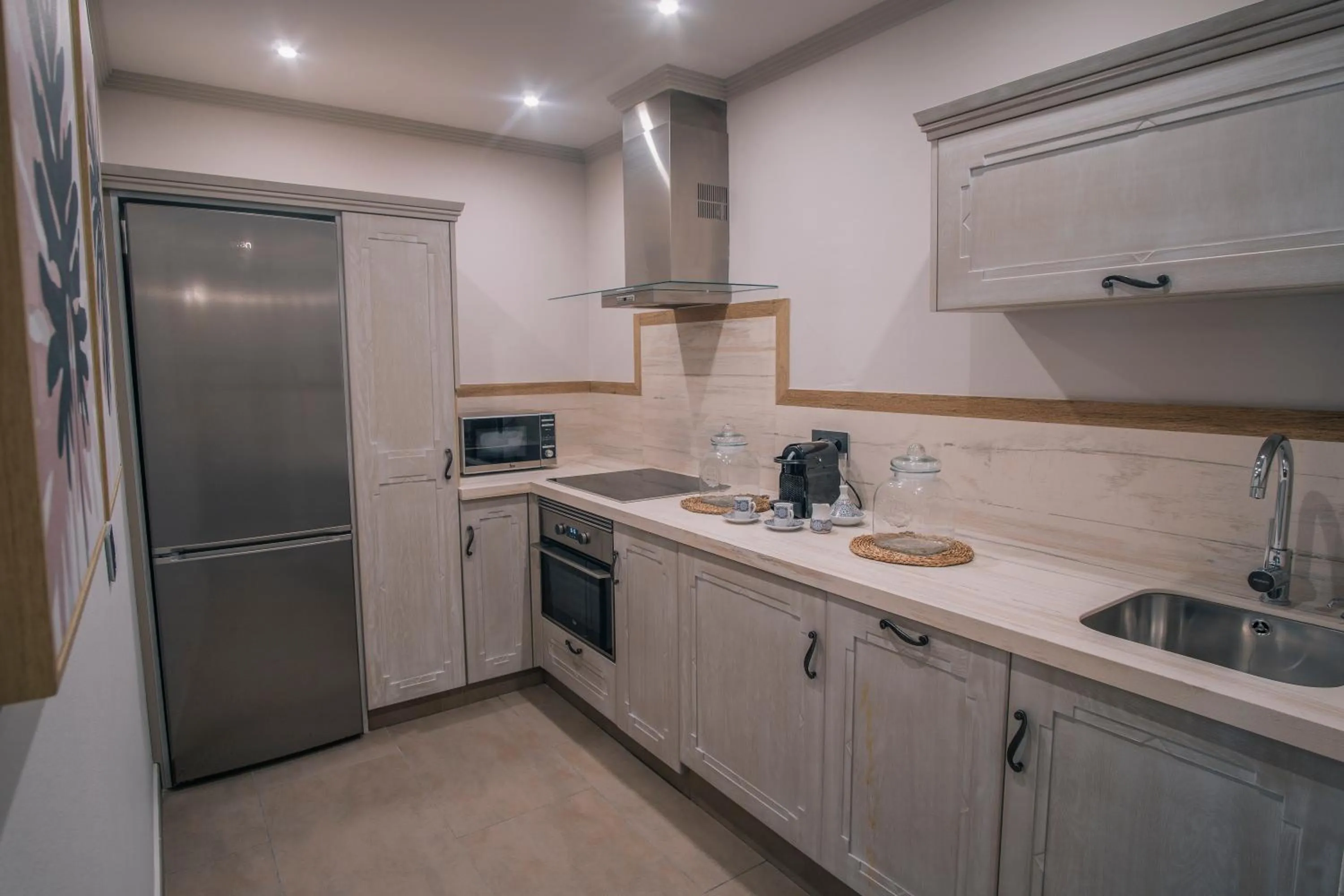 Kitchen or kitchenette in Apartamentos Turísticos La Baílla