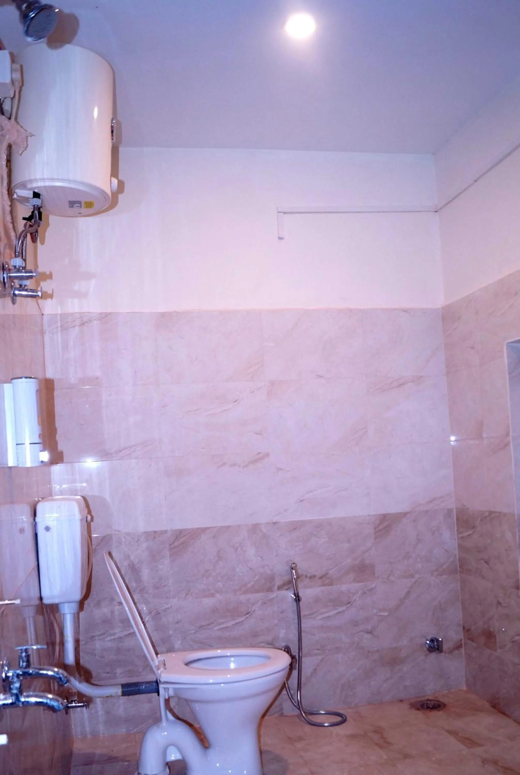 Bathroom in Hotel O Mishra Suites