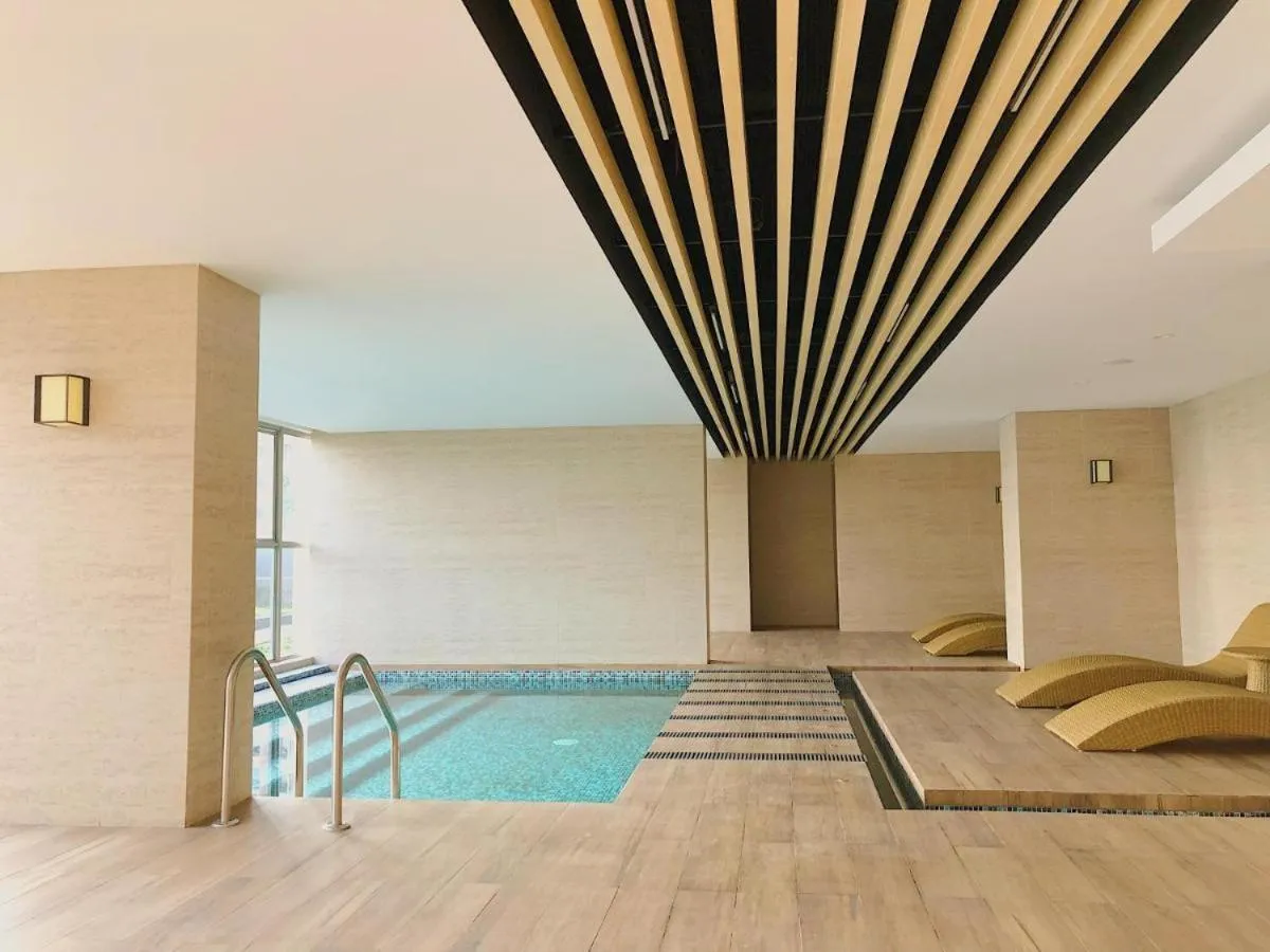 Swimming pool in Gold Coast Apartemen PIK by Dluxx