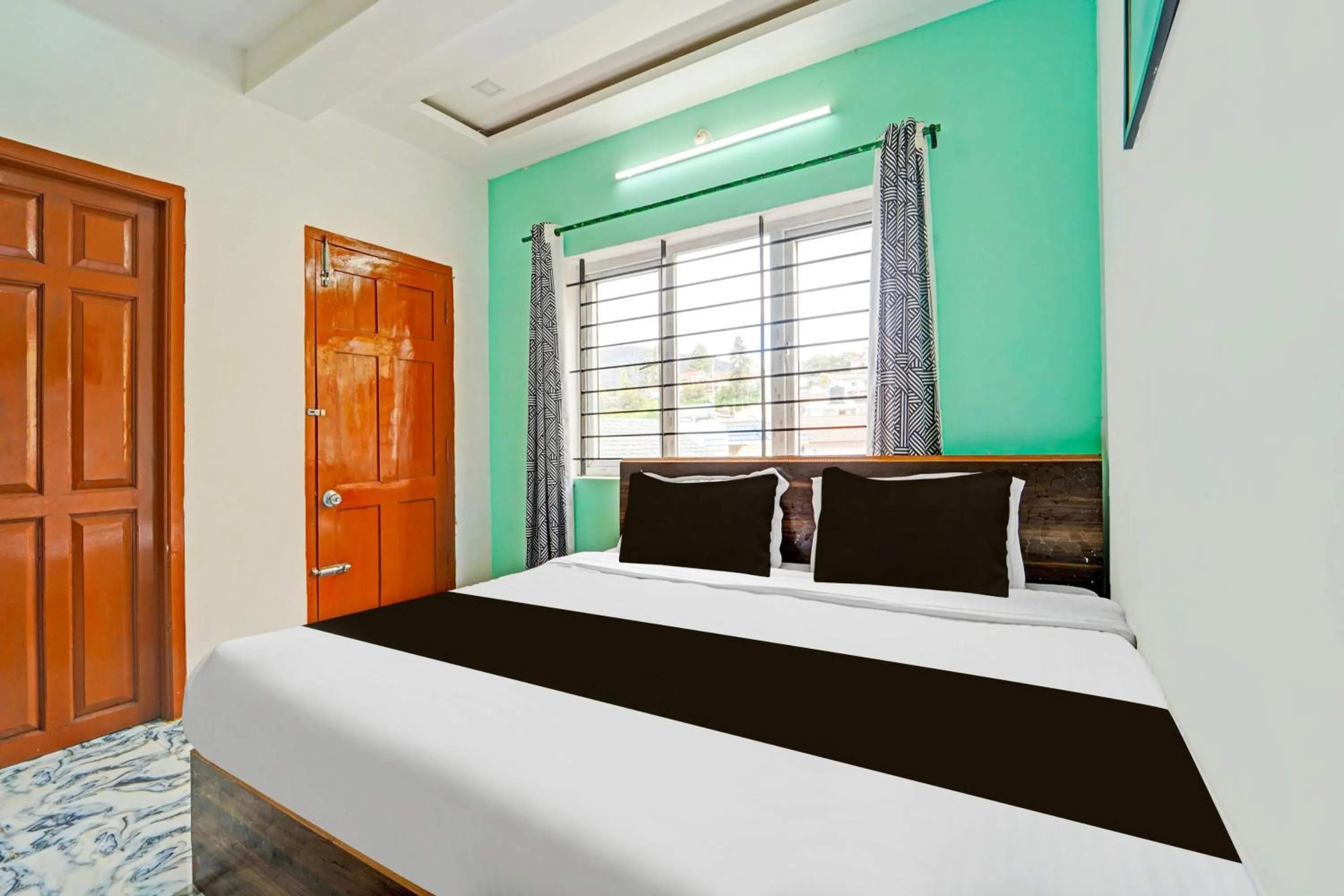 Bedroom, Bed in Super Hotel O Vijaynagar Road Formerly Anmol Peace Stay
