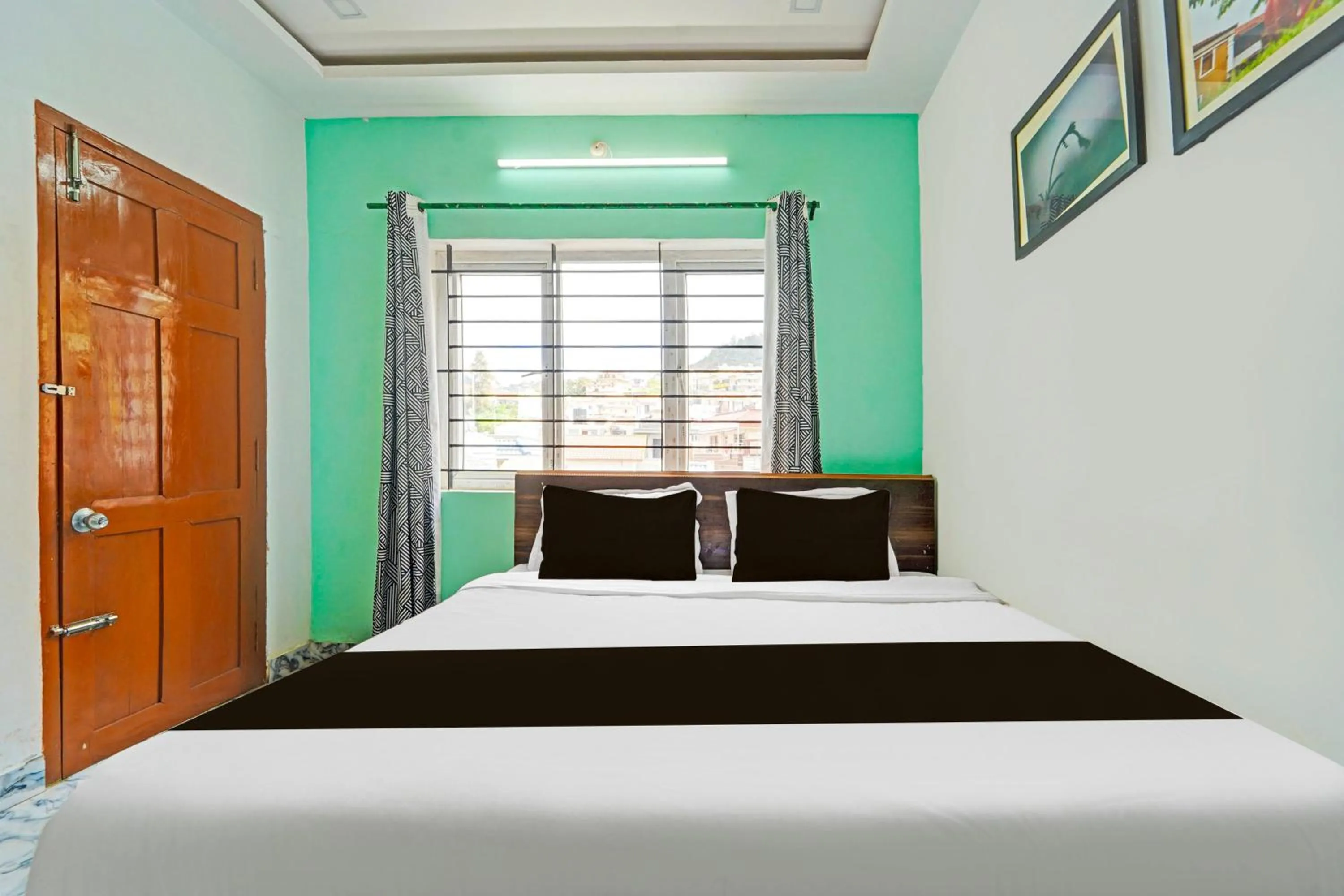 Bedroom, Bed in Super Hotel O Vijaynagar Road Formerly Anmol Peace Stay