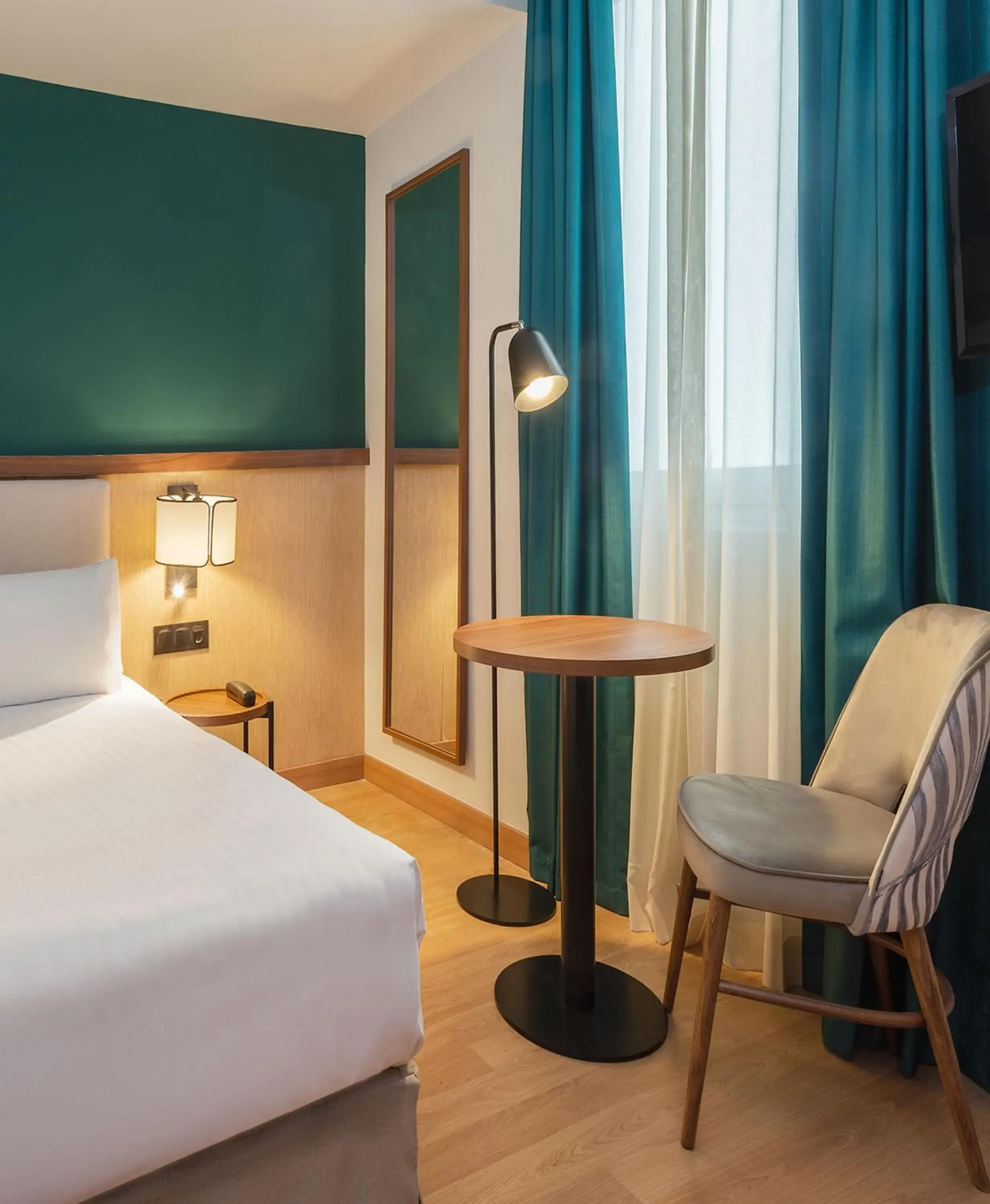 Bed in Hotel Elche Centro Affiliated by Meliá Bed in Hotel Elche Centro Affiliated by Meliá