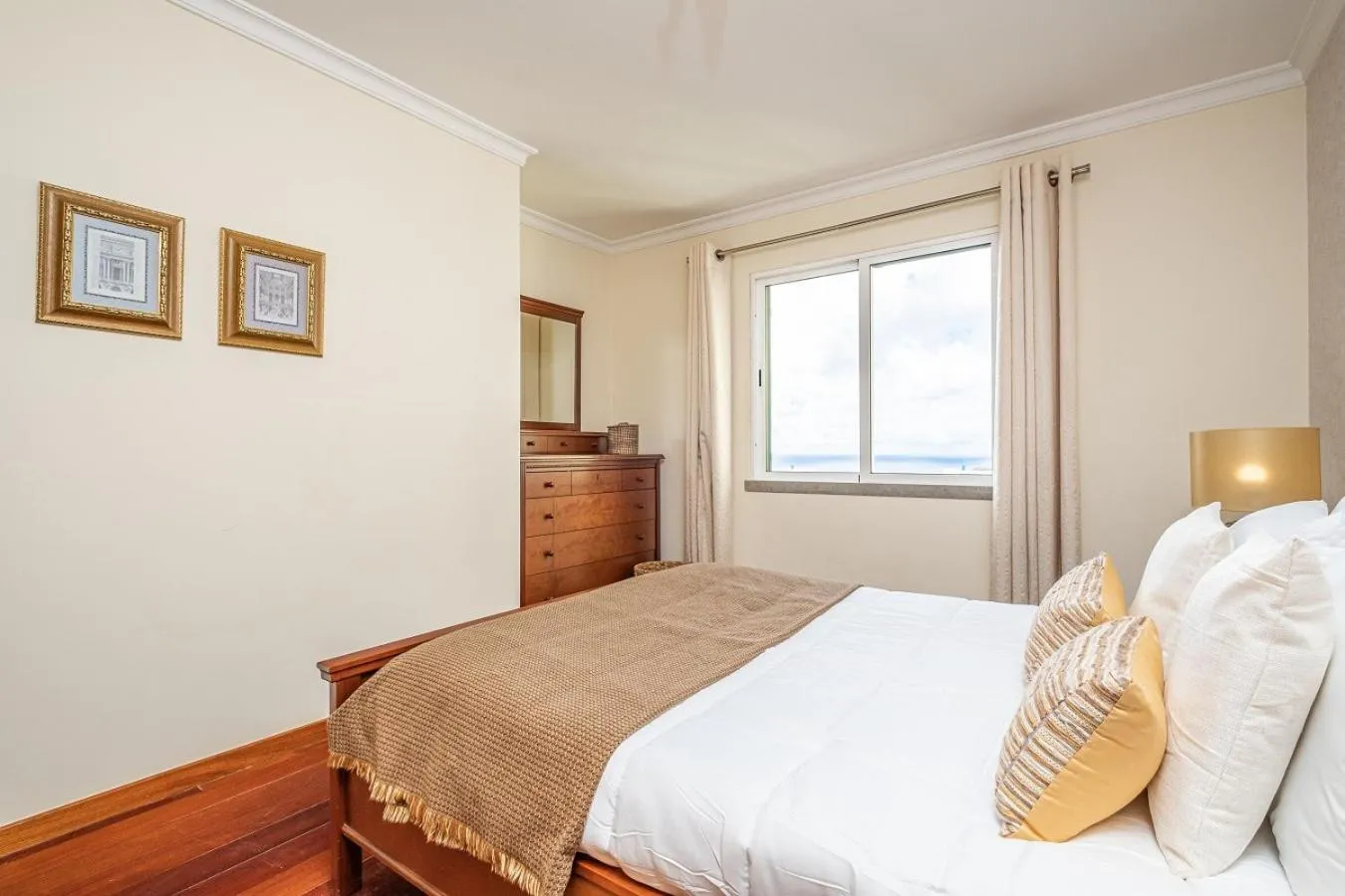 Bed in Bellemar Apartment by Homie